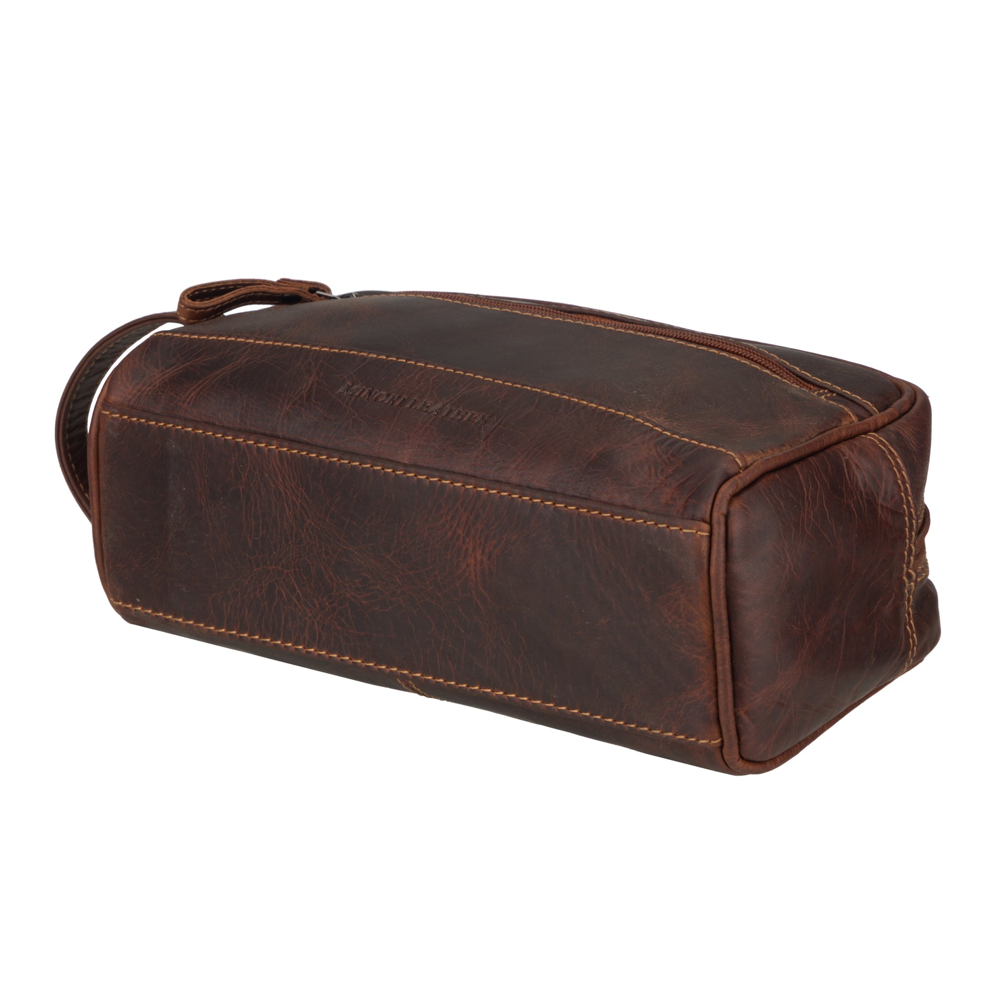 Flat lay bottom of Brown Minori leather toiletry bag on a white background