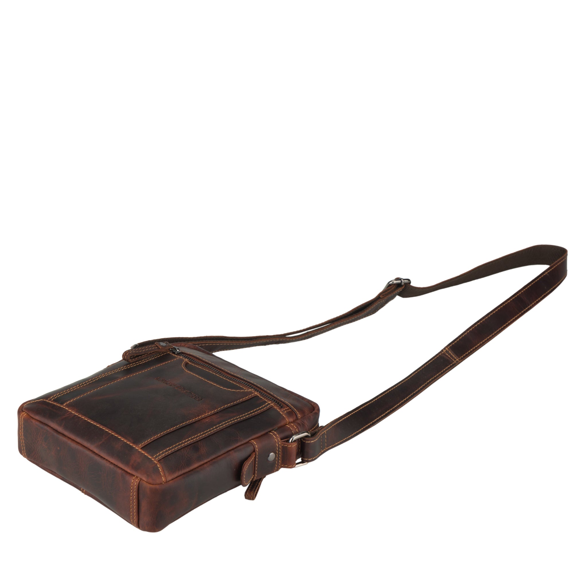 Flat lay view of Brown Minori leather crossbody bag on a white background
