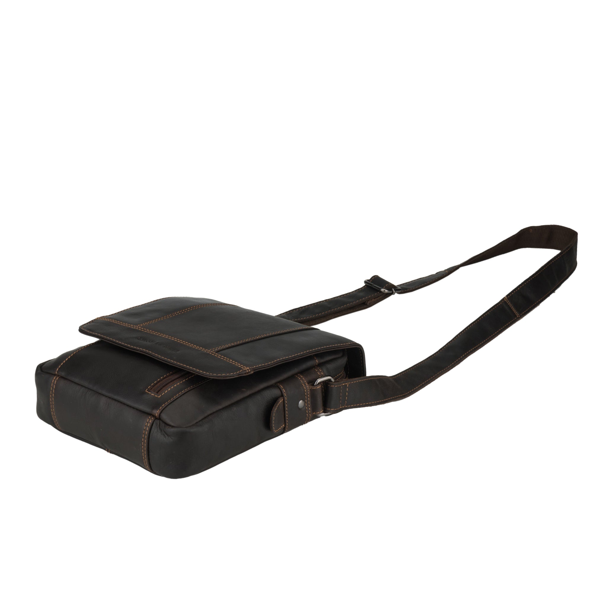 Flat lay view of brown Minori leather bag with a strap on a white background
