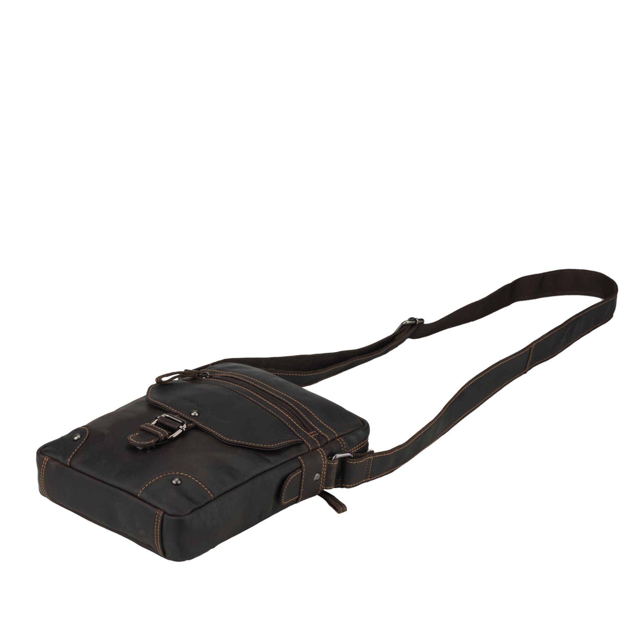Brown Minori leather crossbody bag laid flat with strap extended, displaying the slim profile and bottom detailing.