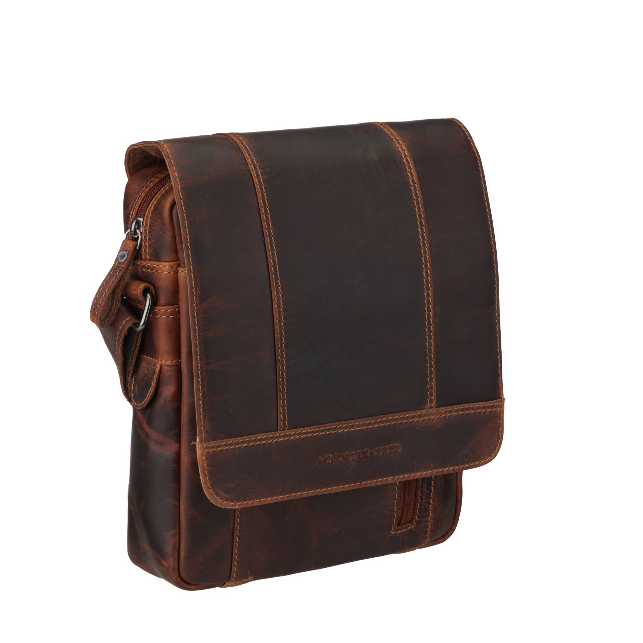 Angled view of Brown Minori leather messenger bag on a white background