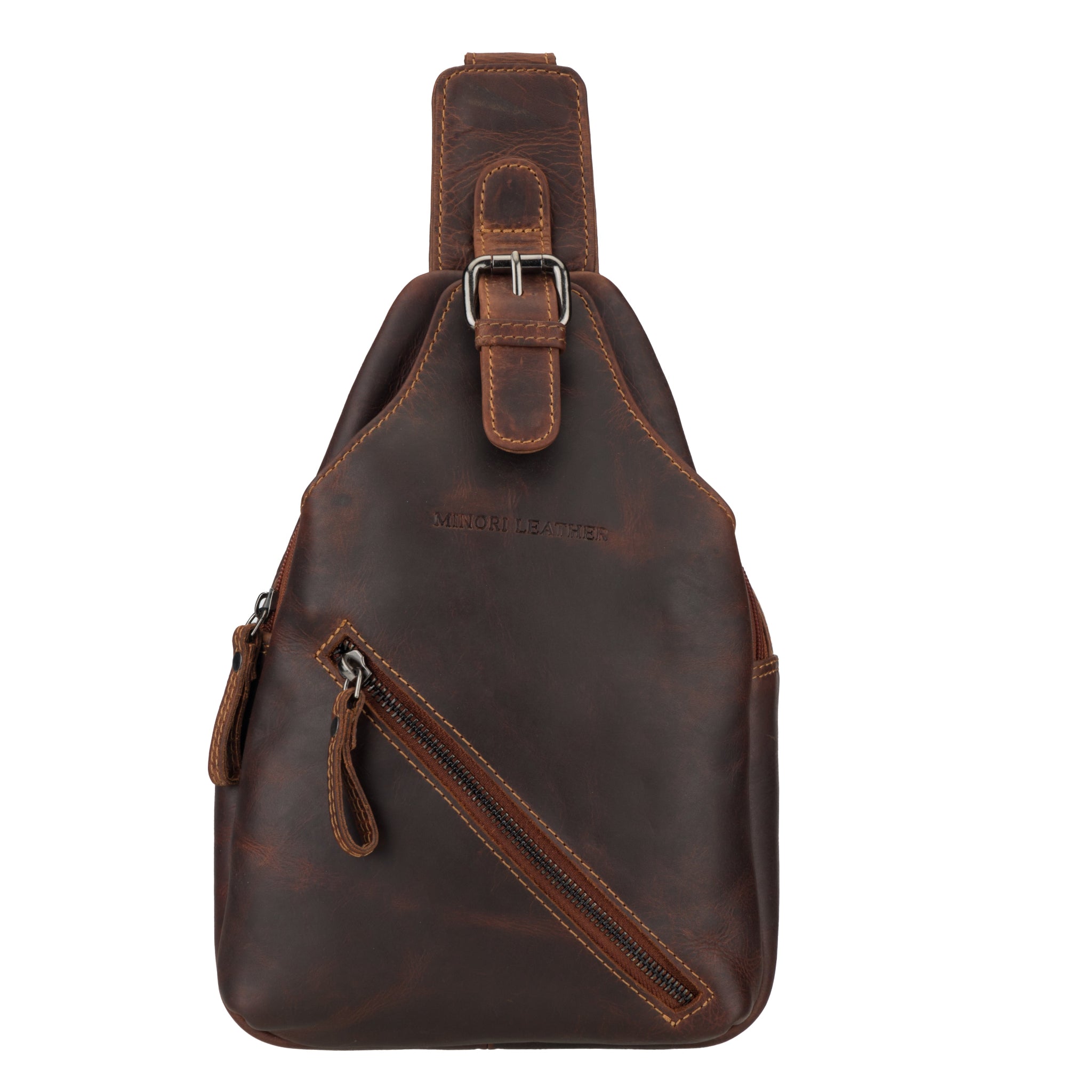 Close-up front view of a chestnut brown Minori leather sling bag showing the buckle and branding.