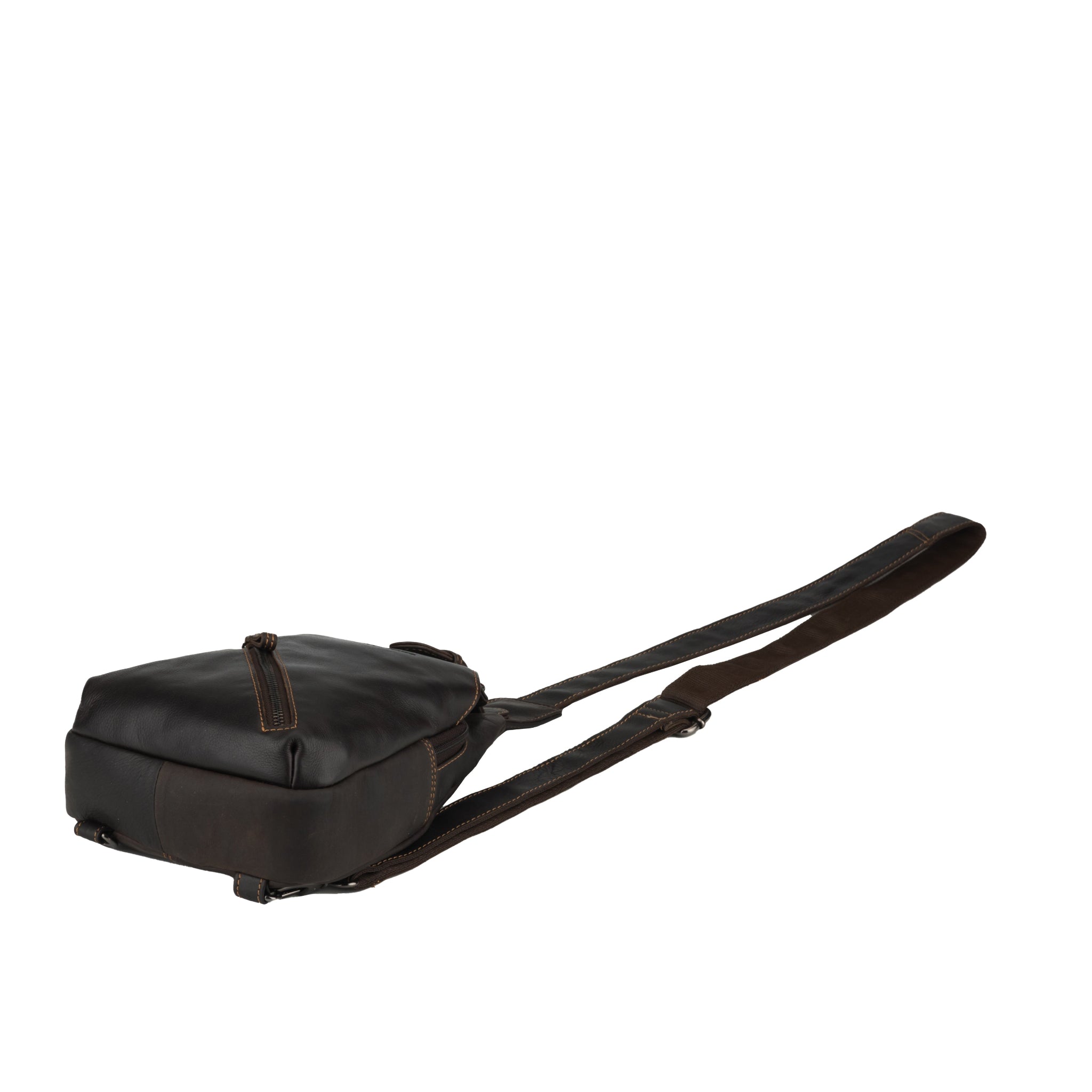 Bottom view of a brown Minori leather sling bag laid flat with the adjustable strap extending outward.
