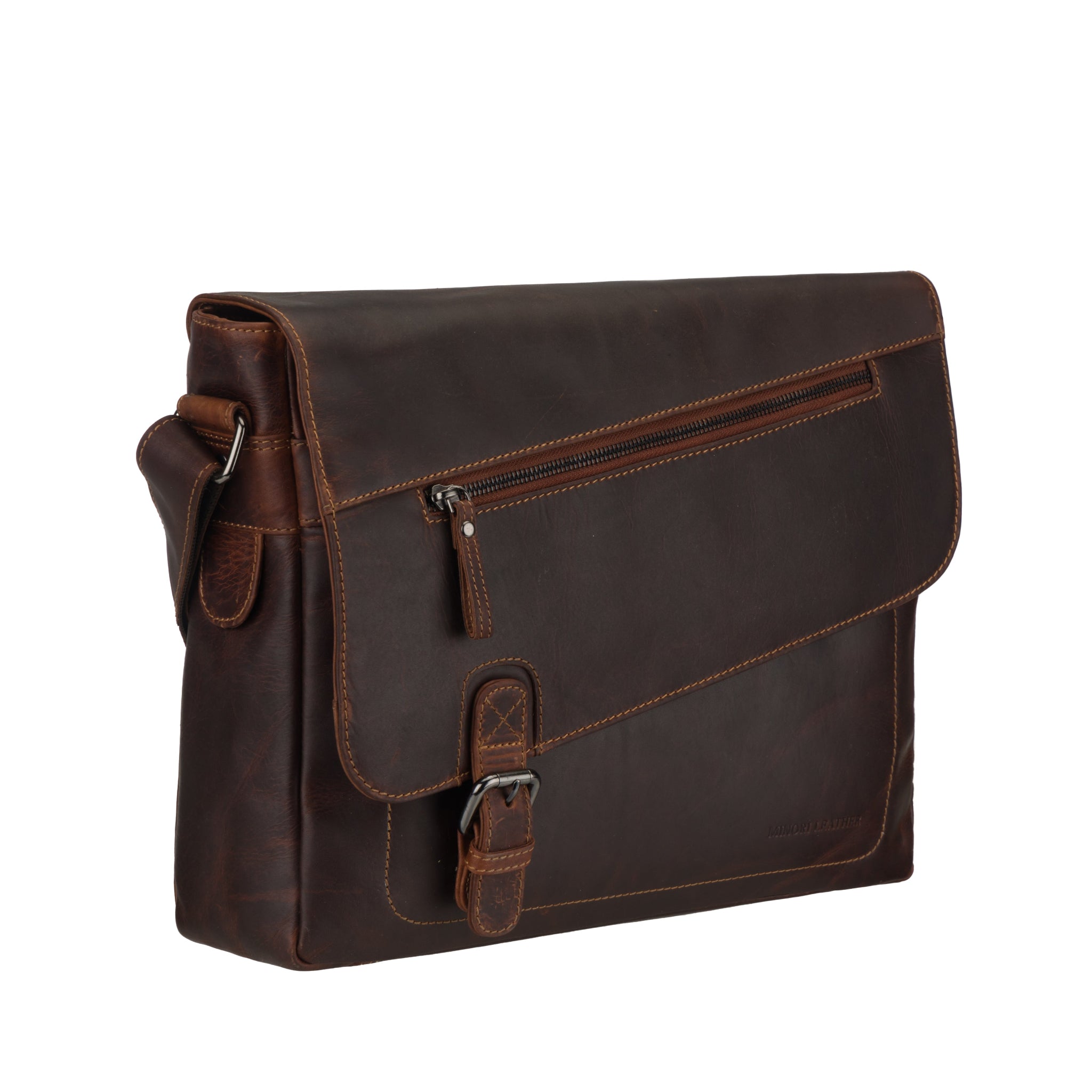 Angled view of Brown Minori leather messenger bag on a white background