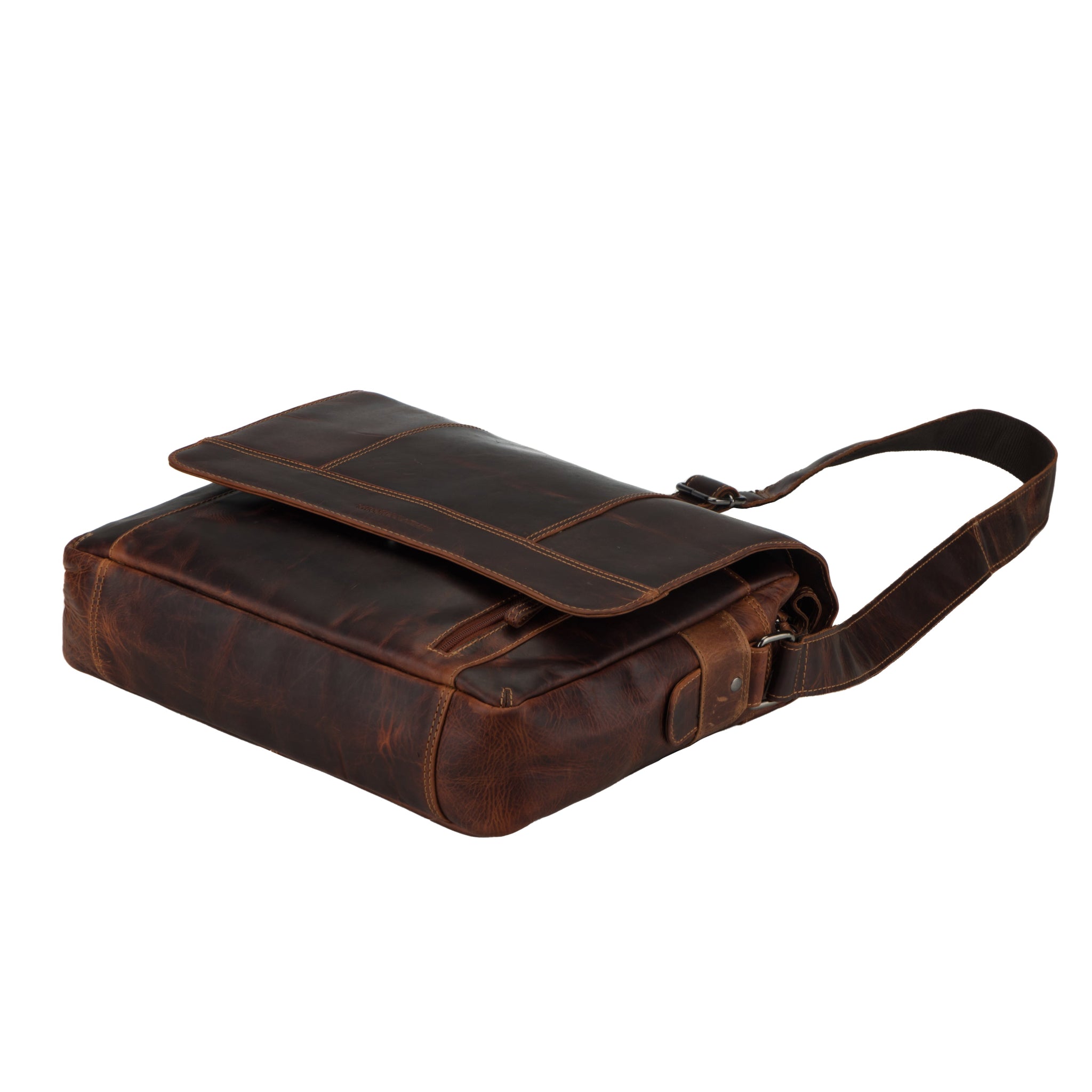 Flat lay view of Brown Minori leather bag with a strap on a white background