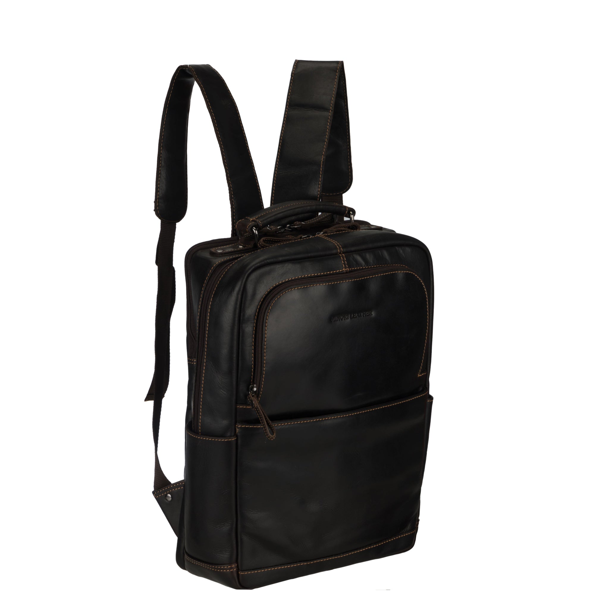 Angled side view of a brown Minori leather backpack showing the front pocket and zipper details.