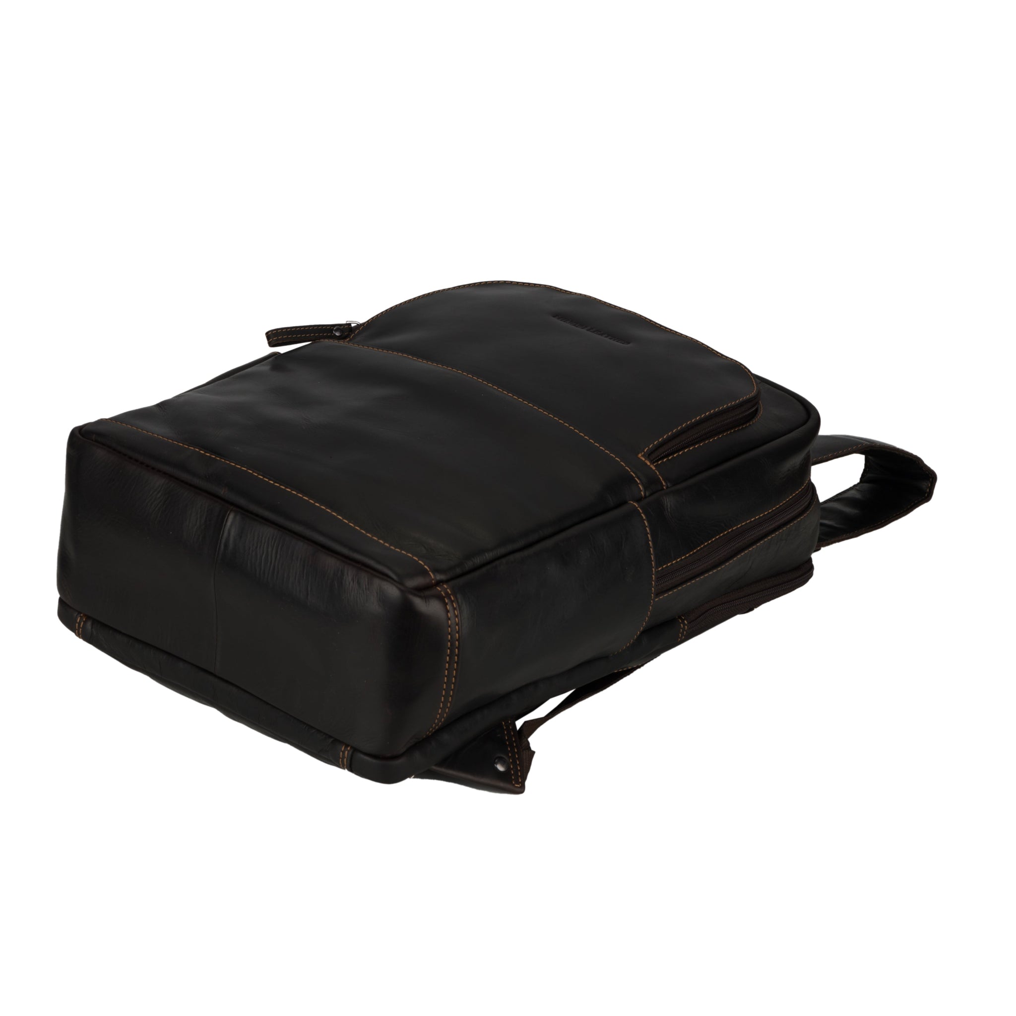 Bottom view of the brown Minori leather backpack lying flat, showcasing its sturdy base and structure.