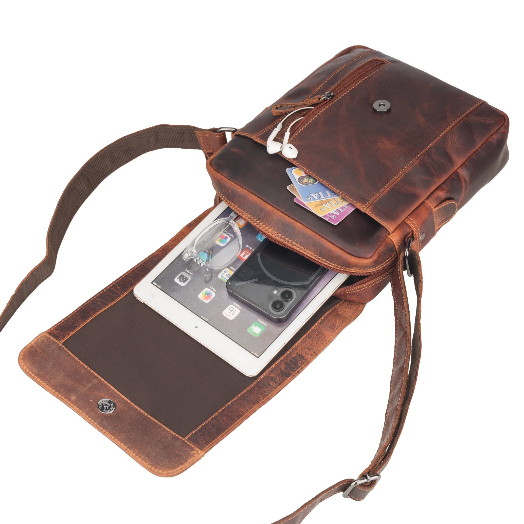 Brown Minori leather crossbody bag with phone and cards on a white background