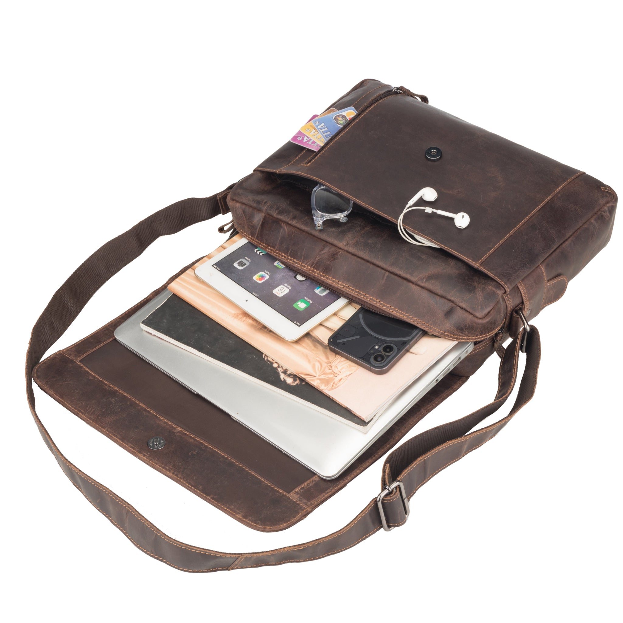 Brown Minori leather bag with a phone and tablet inside on a white background
