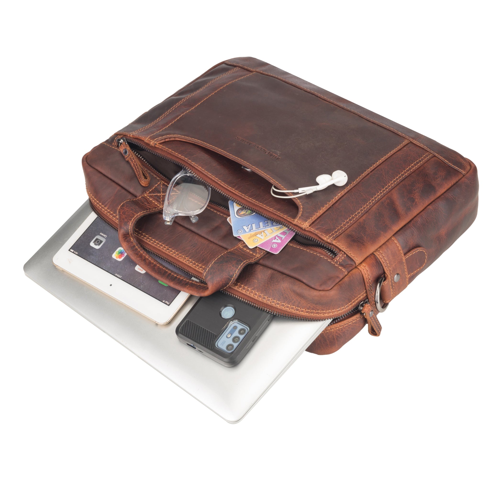 Brown Minori leather briefcase with electronic devices and cards on a white background