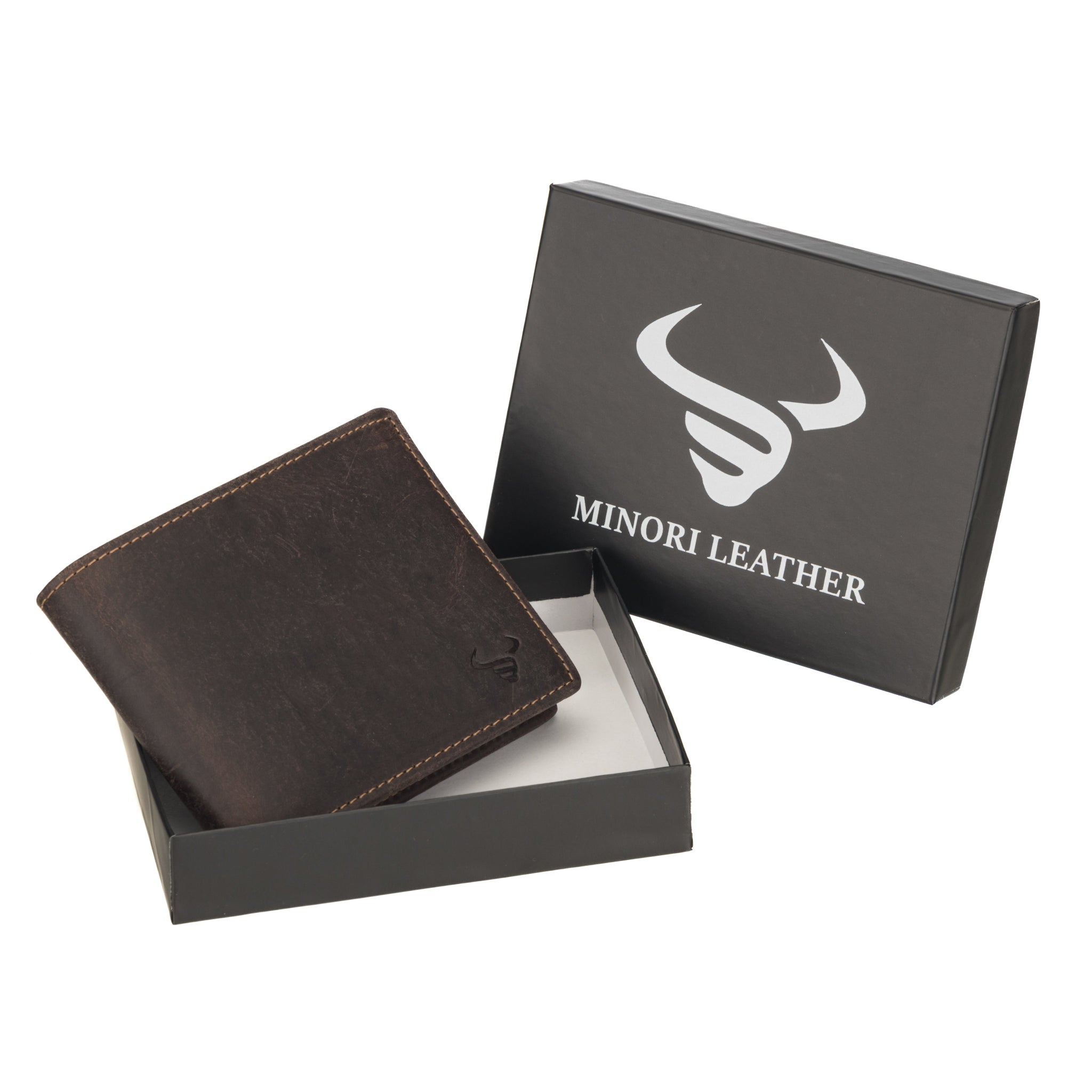 Dark brown Minori leather wallet with visible stitching, partially placed inside a black gift box branded with the Minori Leather logo.