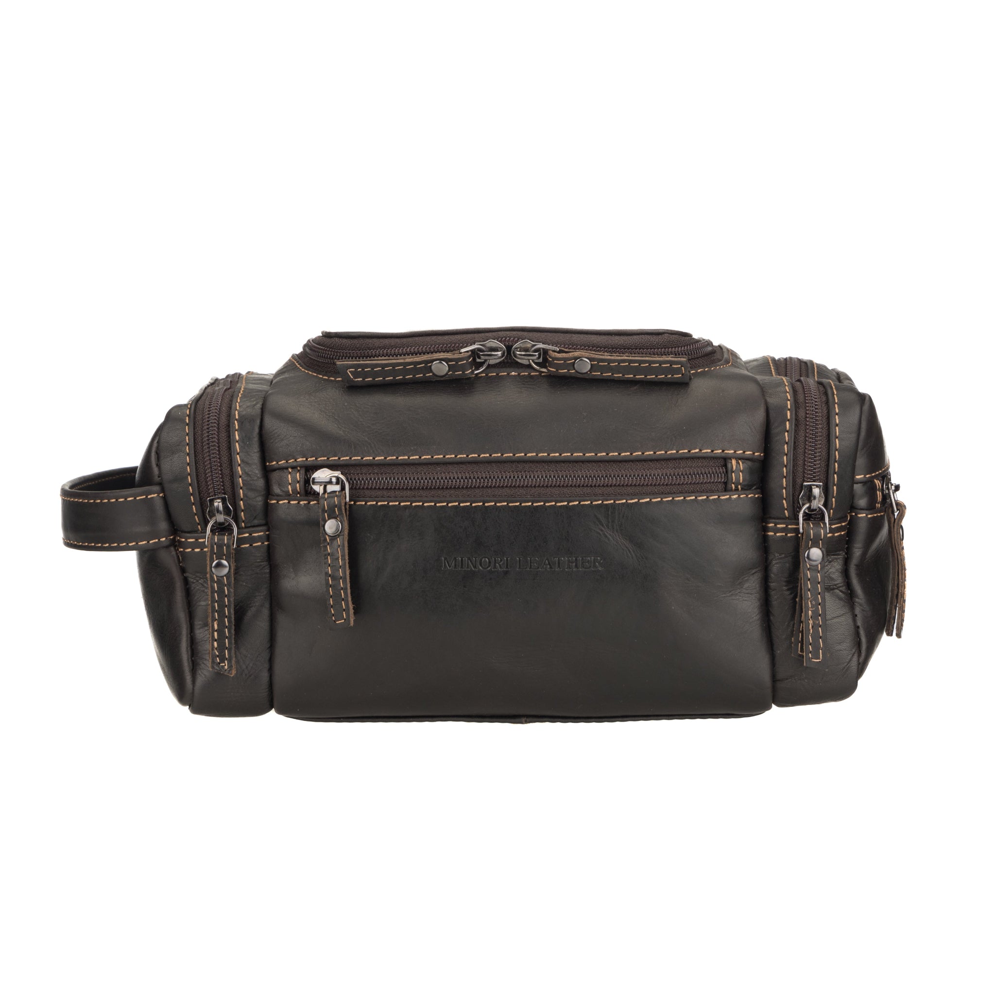 Front view of a brown Minori leather toiletry bag featuring multiple zippered compartments and contrast stitching, branded 'Minori Leather'.