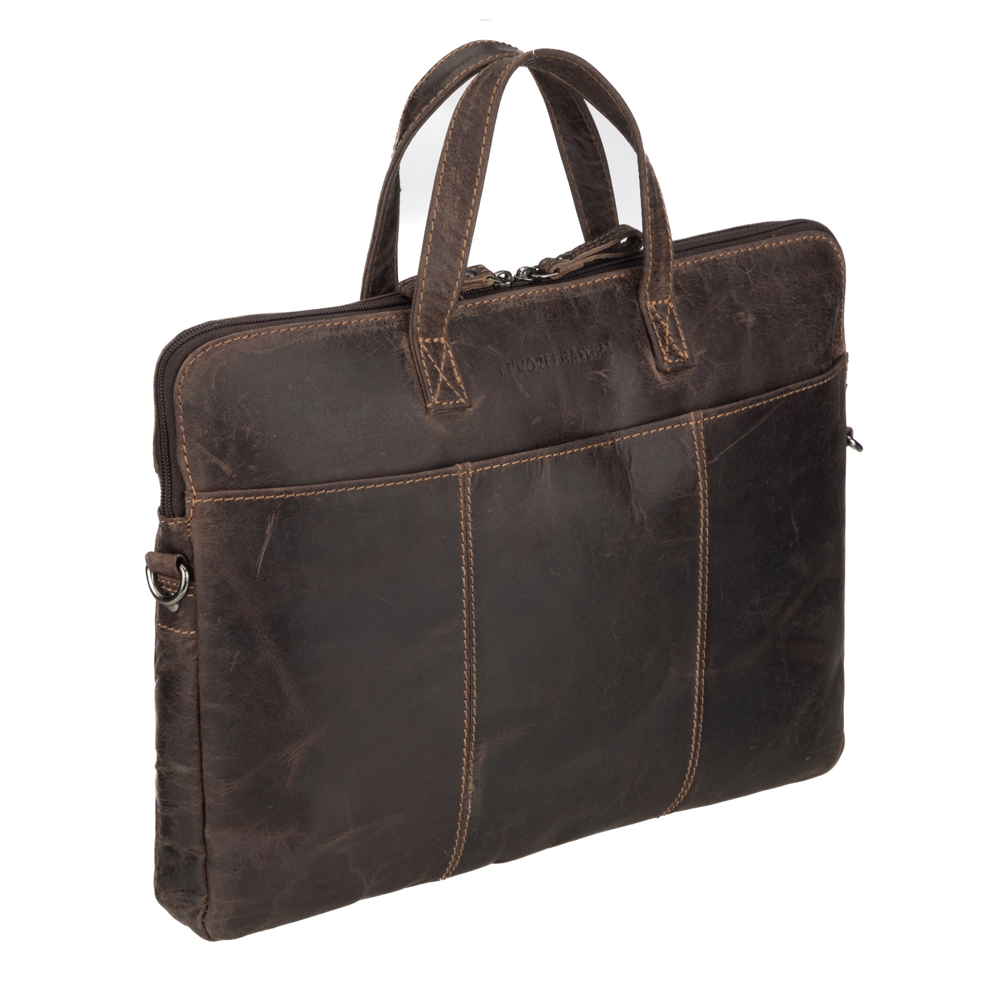Angled side view of a rugged brown Minori leather laptop bag showing textured leather and reinforced stitching.