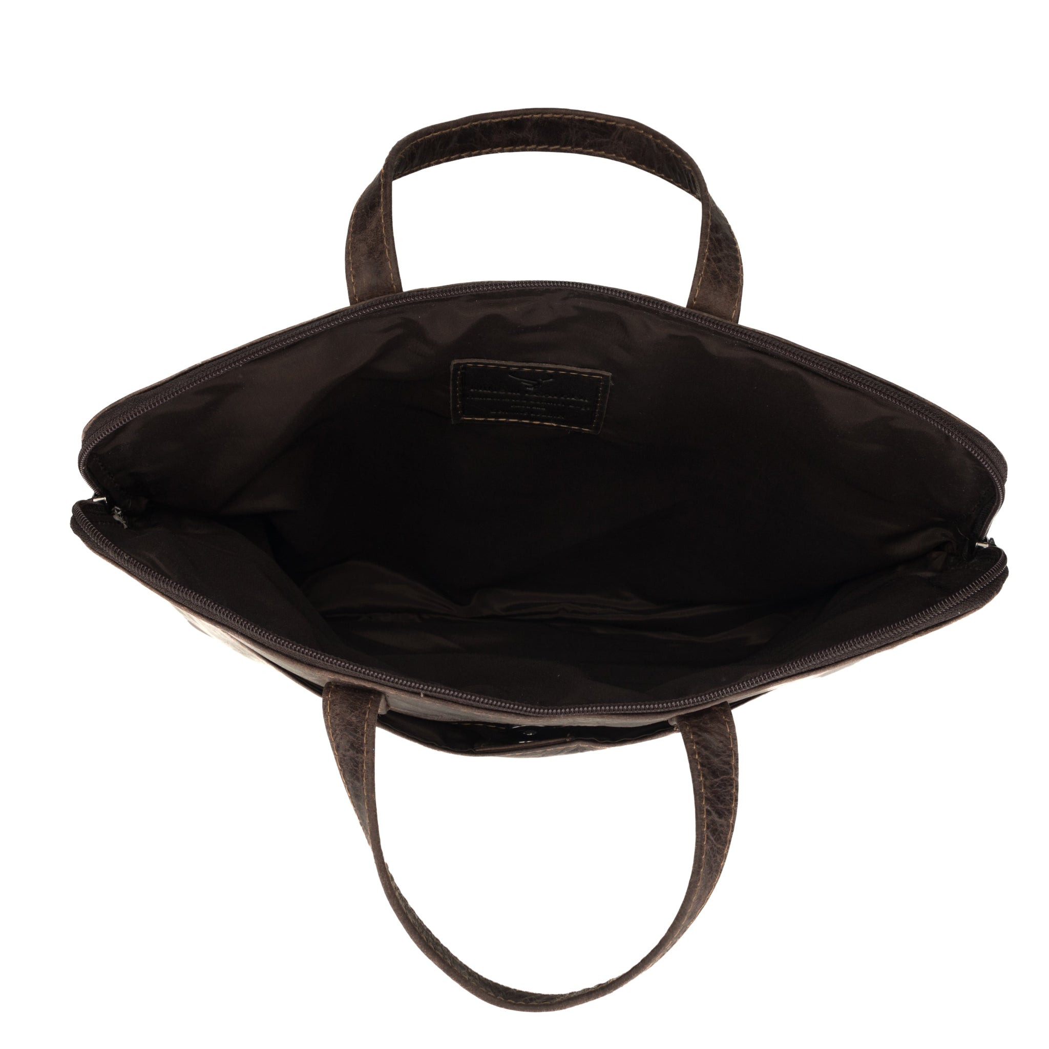 Top-down view of the interior of a brown Minori leather laptop bag, showing the spacious main compartment.