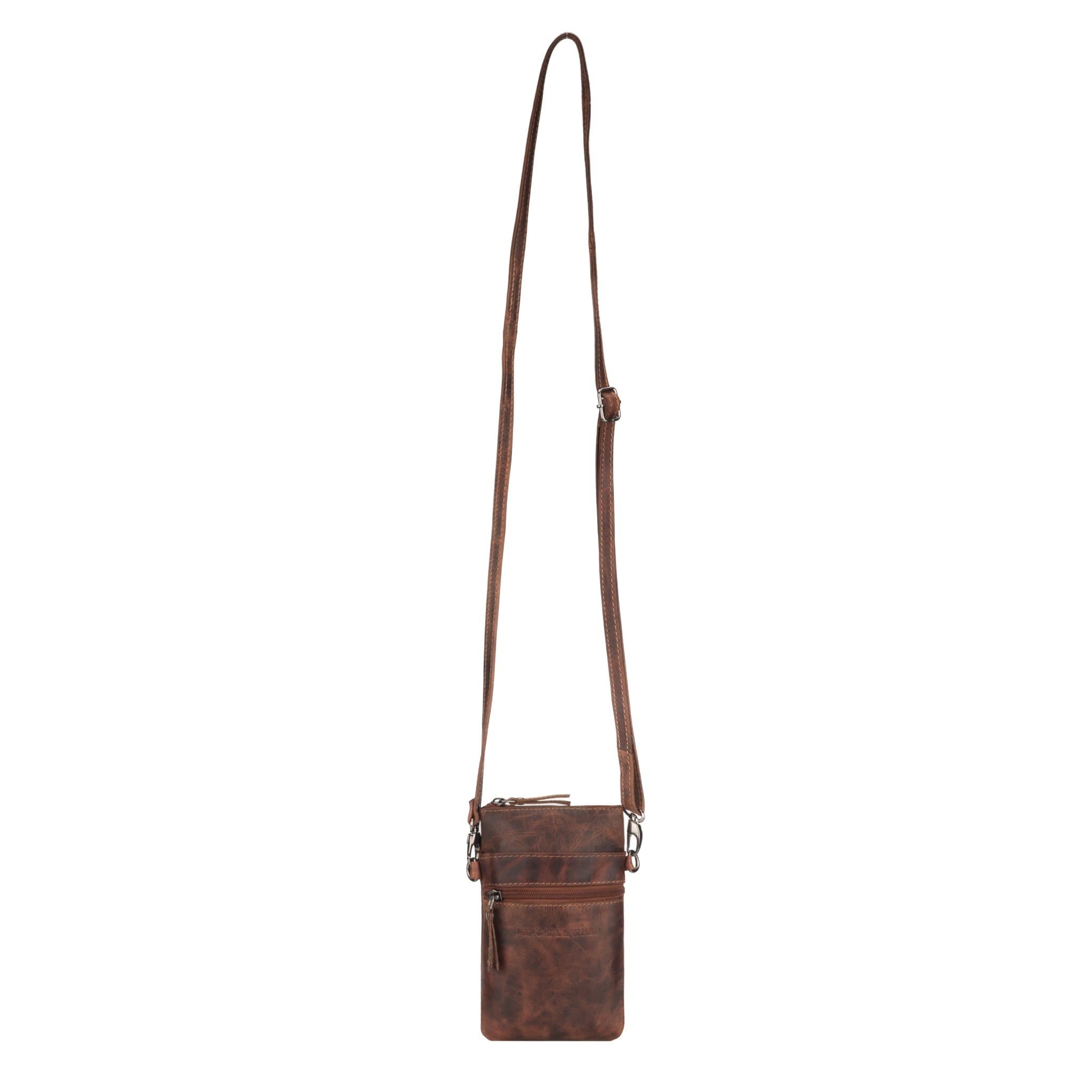 Chestnut brown Minori leather crossbody pouch with adjustable long strap shown against white background.