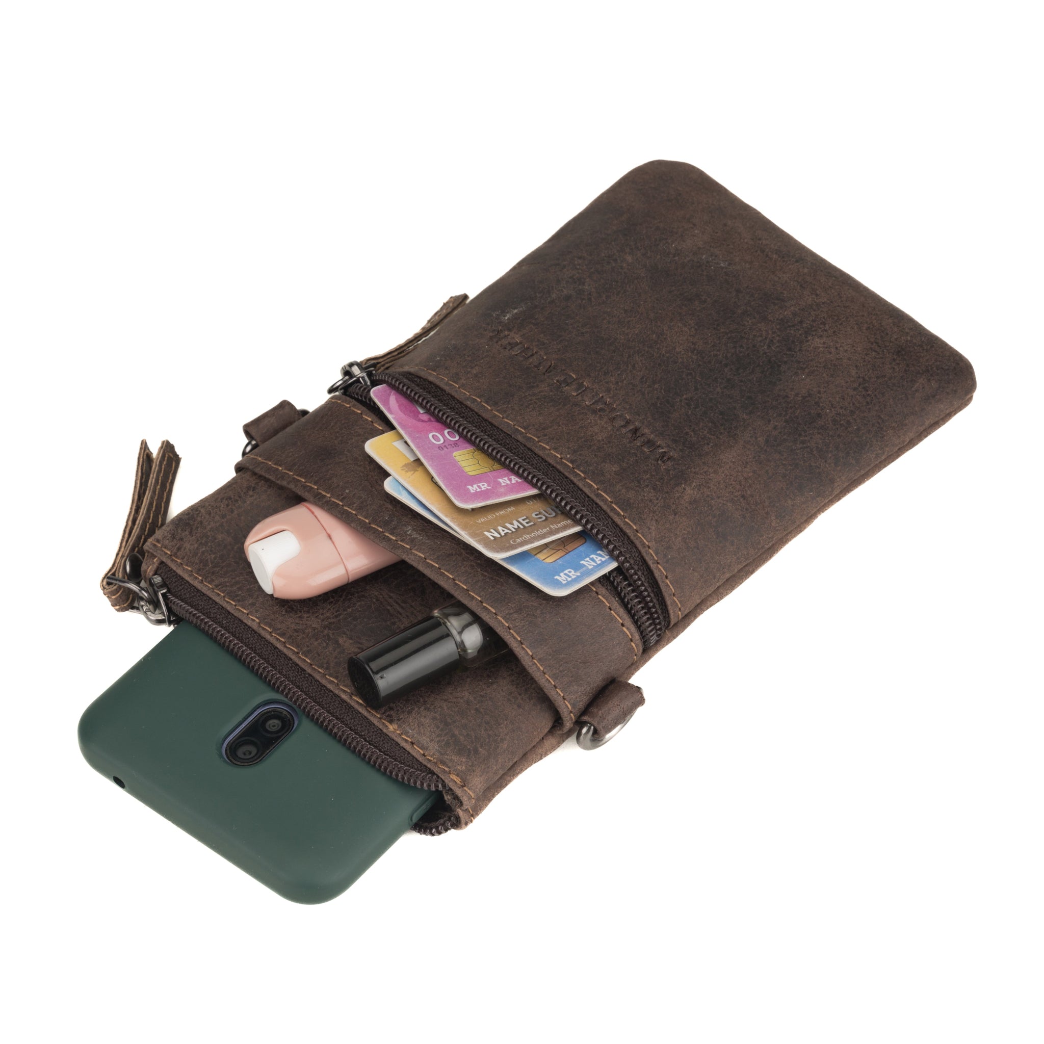 Brown Minori leather phone pouch filled with items including a phone, cards, and small essentials.