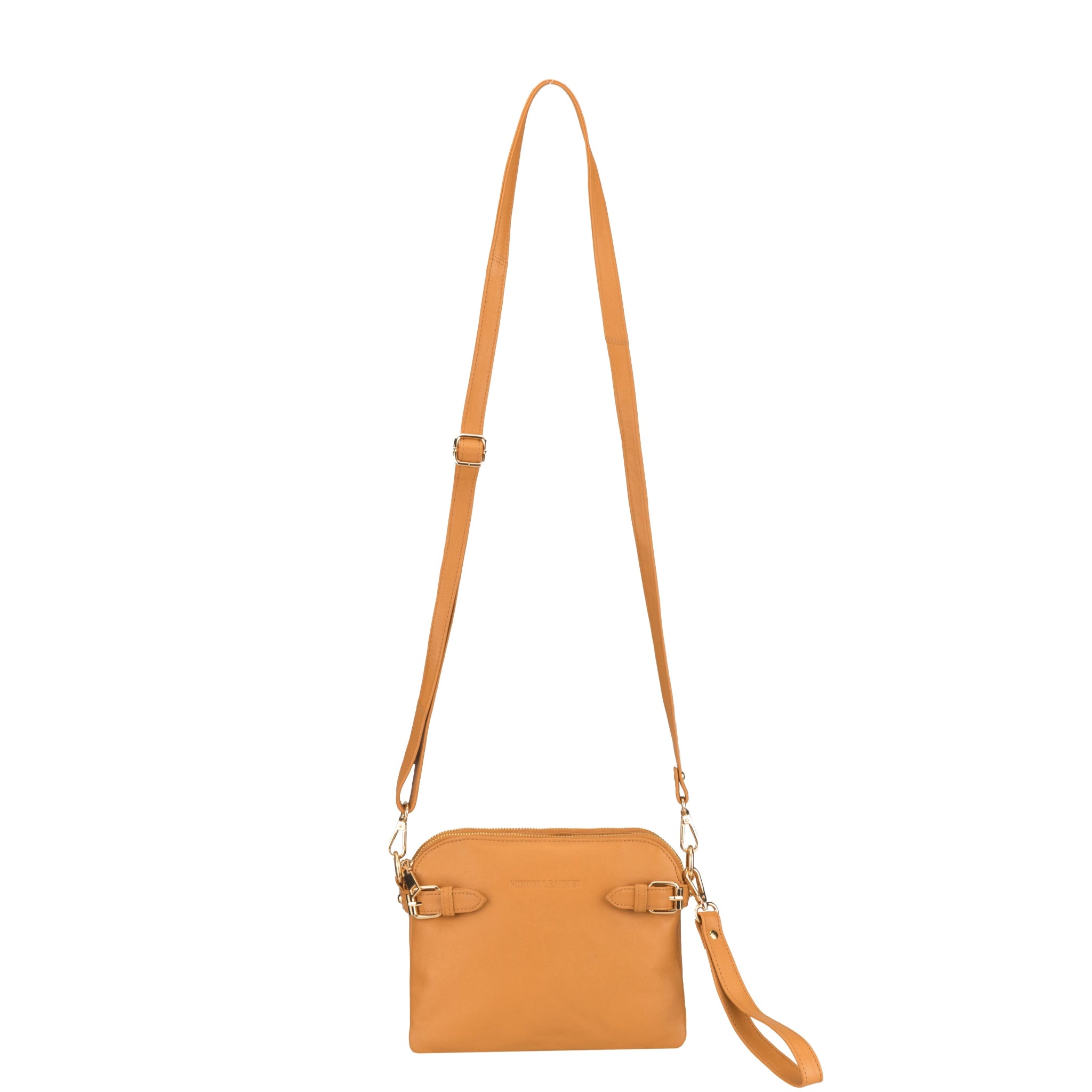Tan Minori leather crossbody bag with long adjustable strap, displayed against a white background.
