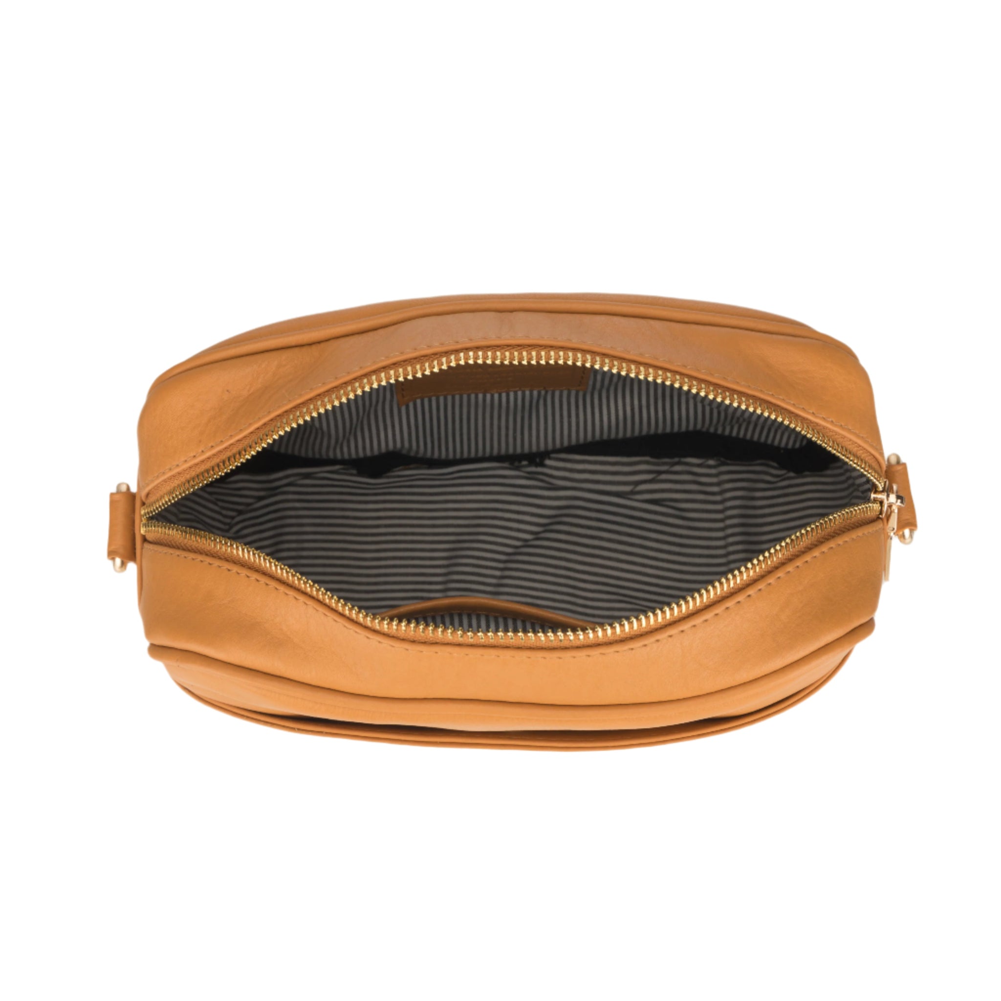 Top-down view of an open Tan Minori leather crossbody bag showing a striped fabric interior.