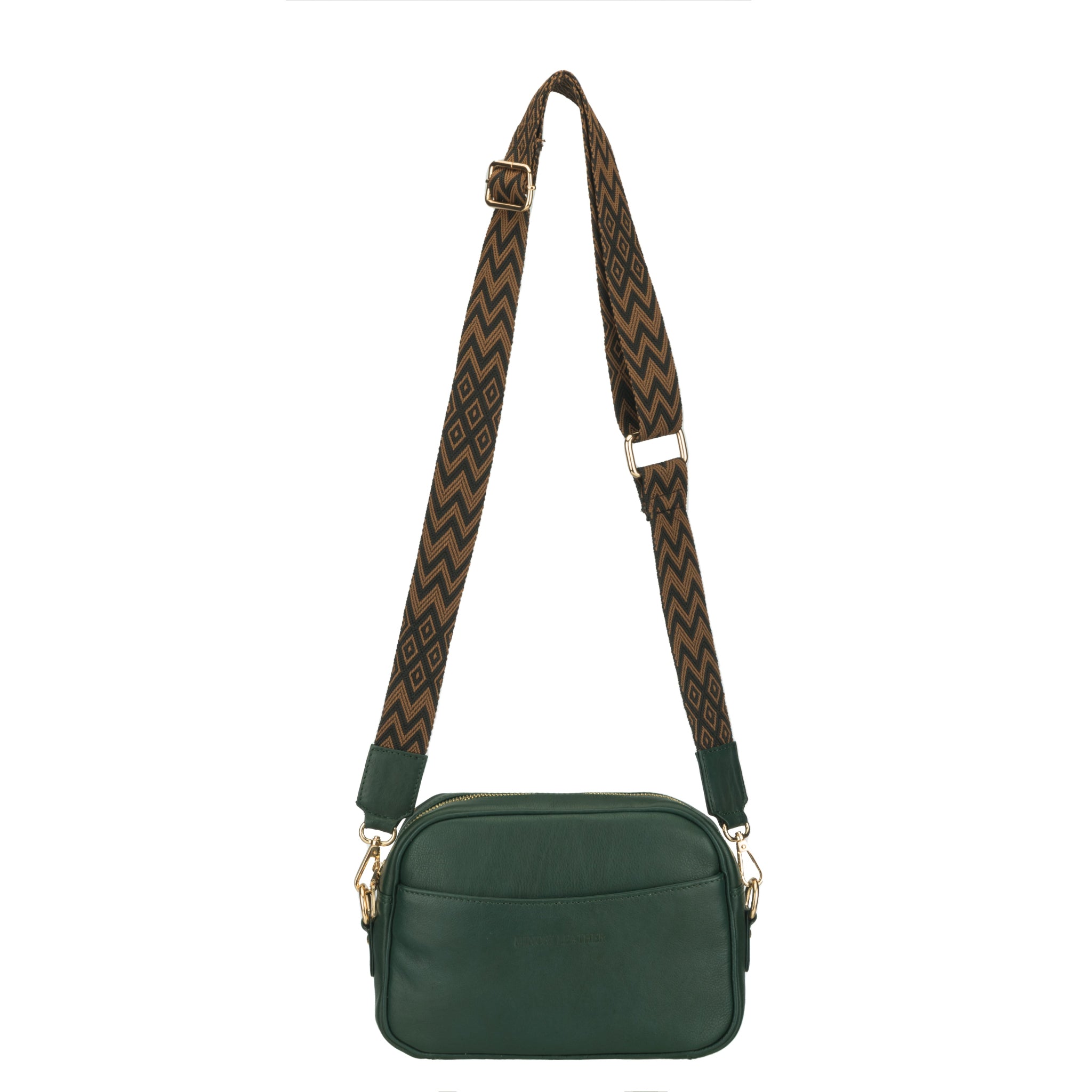 Forest Green Minori leather crossbody bag with a wide, patterned shoulder strap and gold hardware, shown in a hanging position.