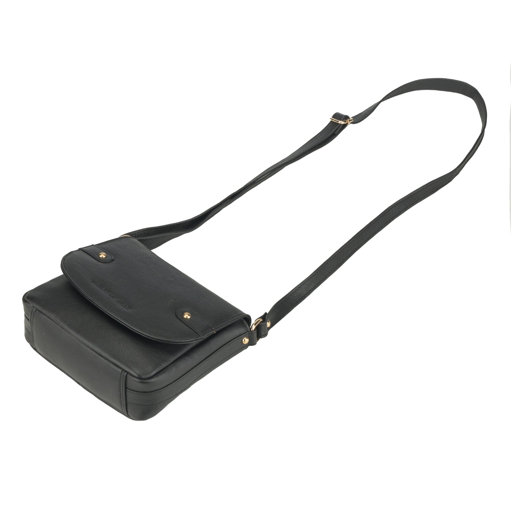 Flat lay view of Black Minori leather crossbody bag on a white background