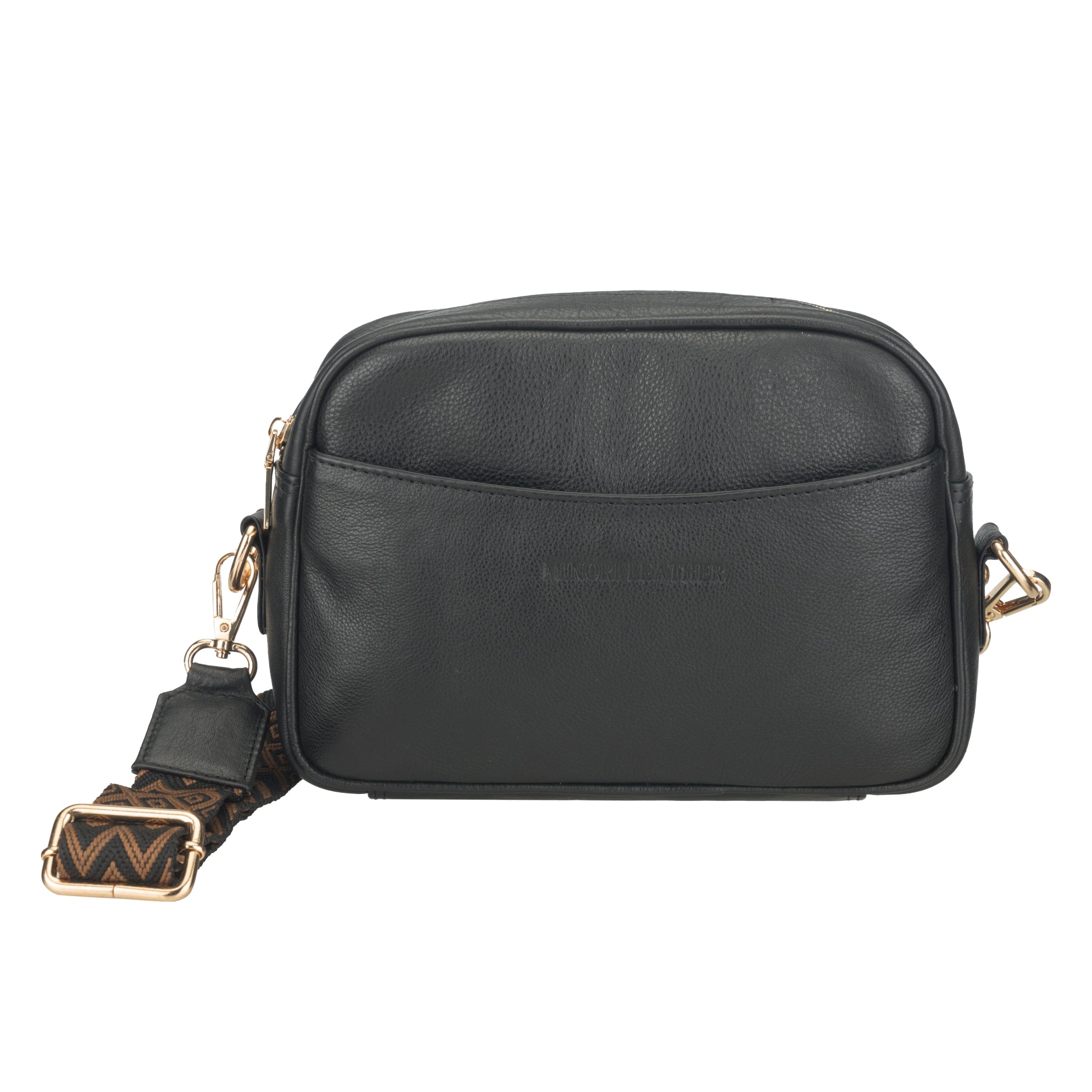 Front view of a black Minori leather crossbody bag with embossed branding and detachable patterned strap.