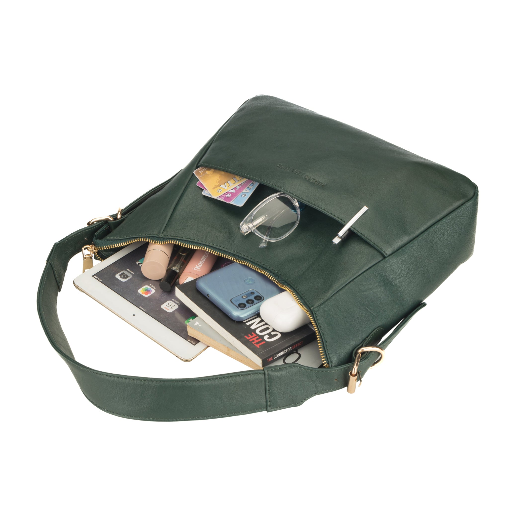 Forest Green nappa leather bag filled with everyday essentials including books, makeup, and electronics.