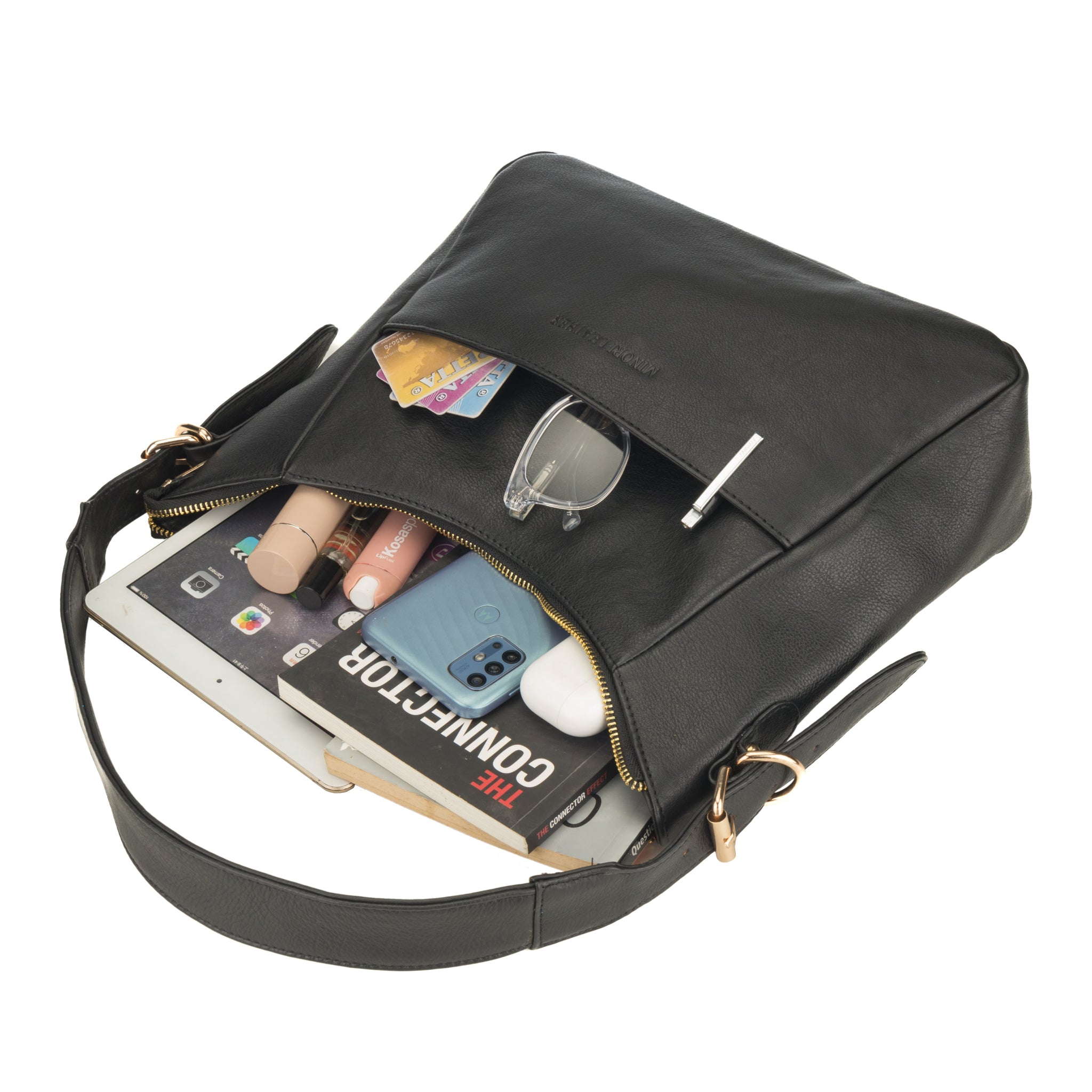 Black Nappa Minori leather bag filled with everyday essentials including books, makeup, and electronics.