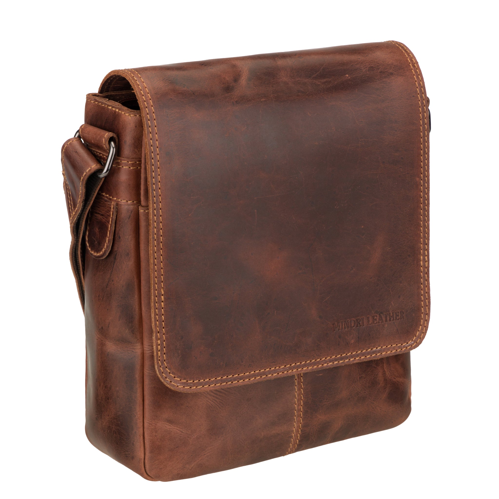 Angled view of Brown Minori leather messenger bag on a white background