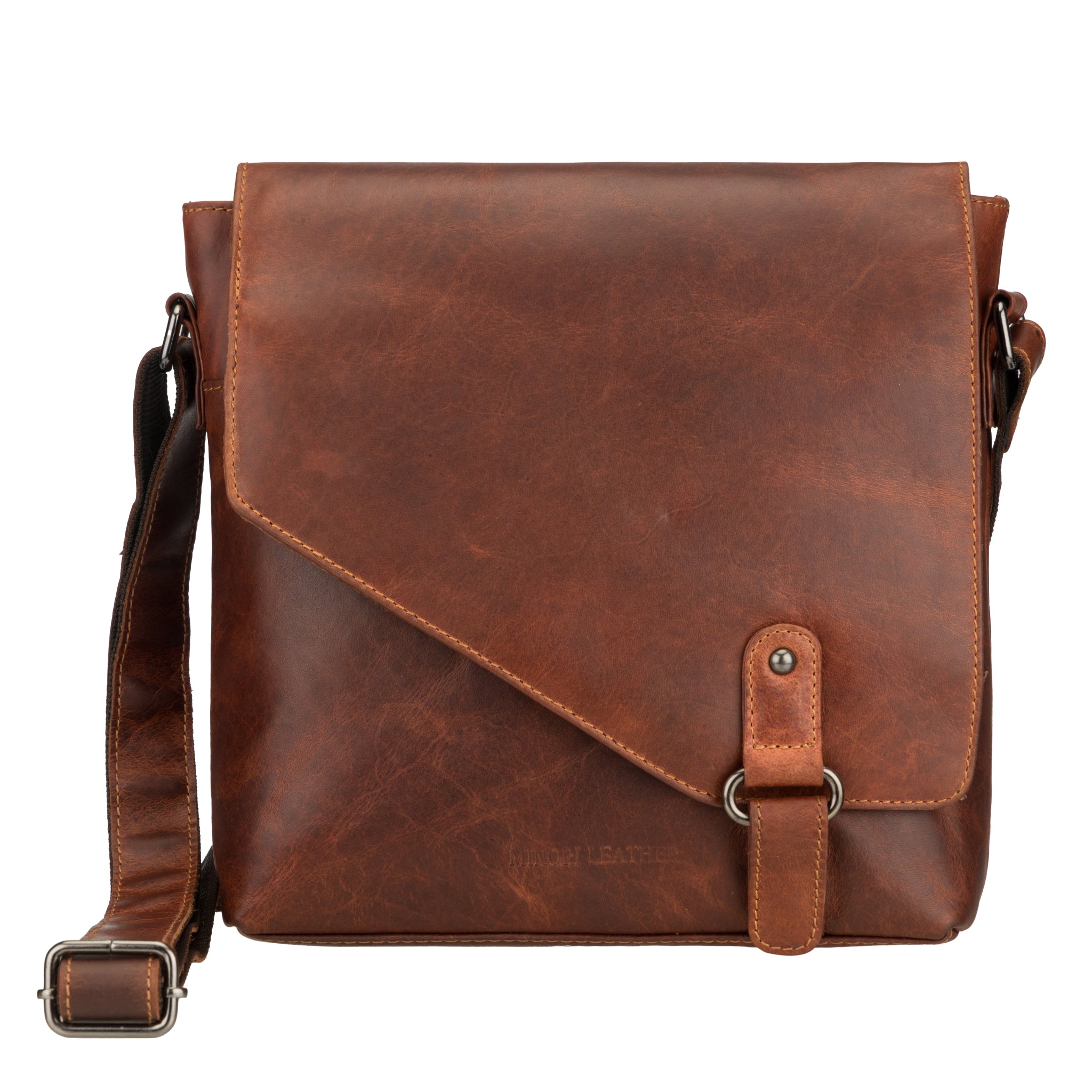 A close-up front view of the brown Minori Leather crossbody bag showing the fine leather grain and buckle detail
