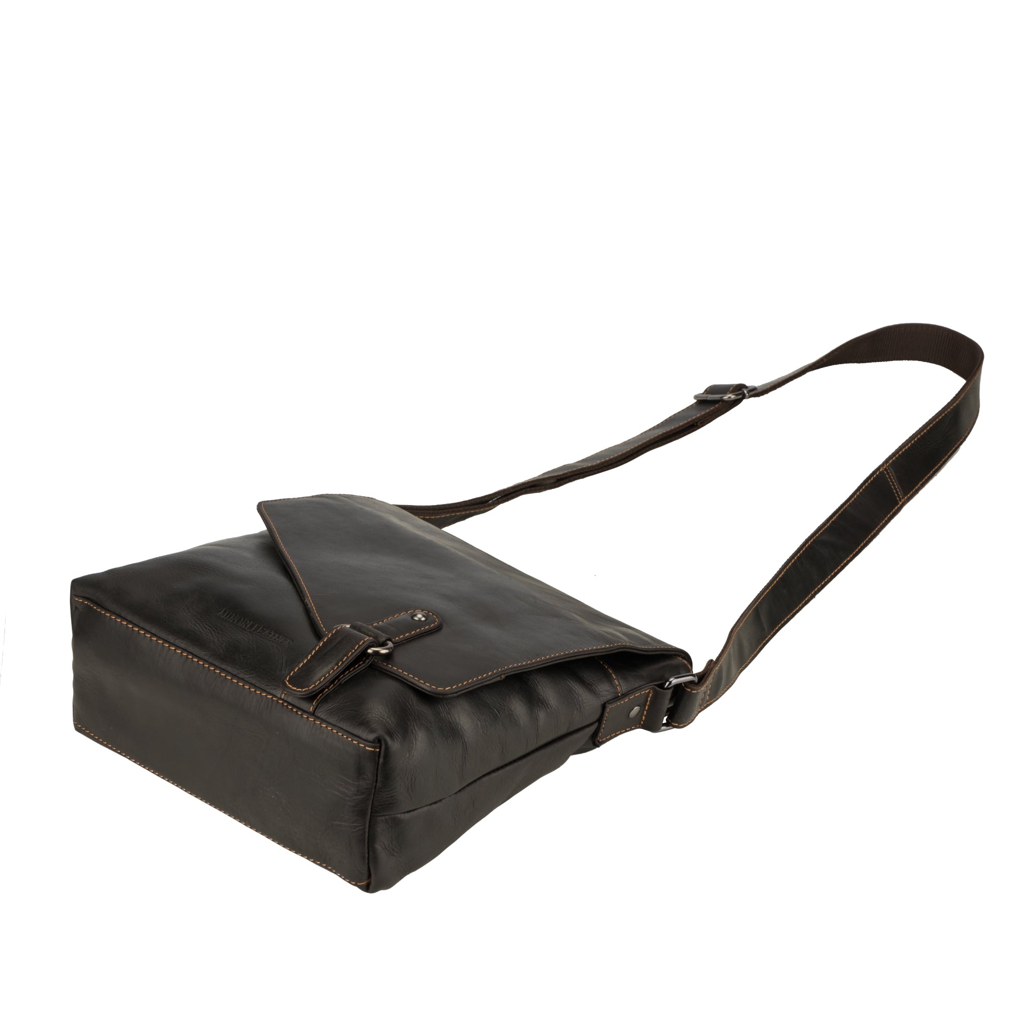 Side profile of a Brown Minori leather messenger bag laid flat, highlighting the structure and stitching.