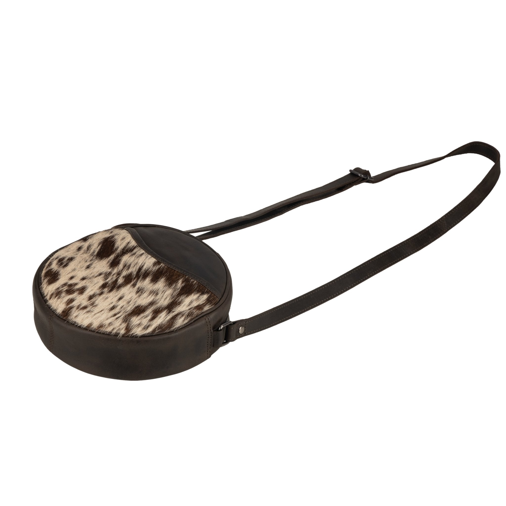 Minori Leather Luna leather round crossbody bag in chestnut and hair-on brown with adjustable strap for women.