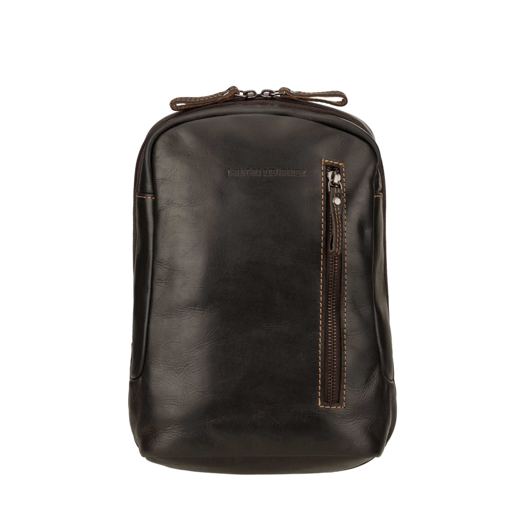 Straight-on front view of a brown Minori leather crossbody sling bag showing the vertical zippered pocket and brand logo.