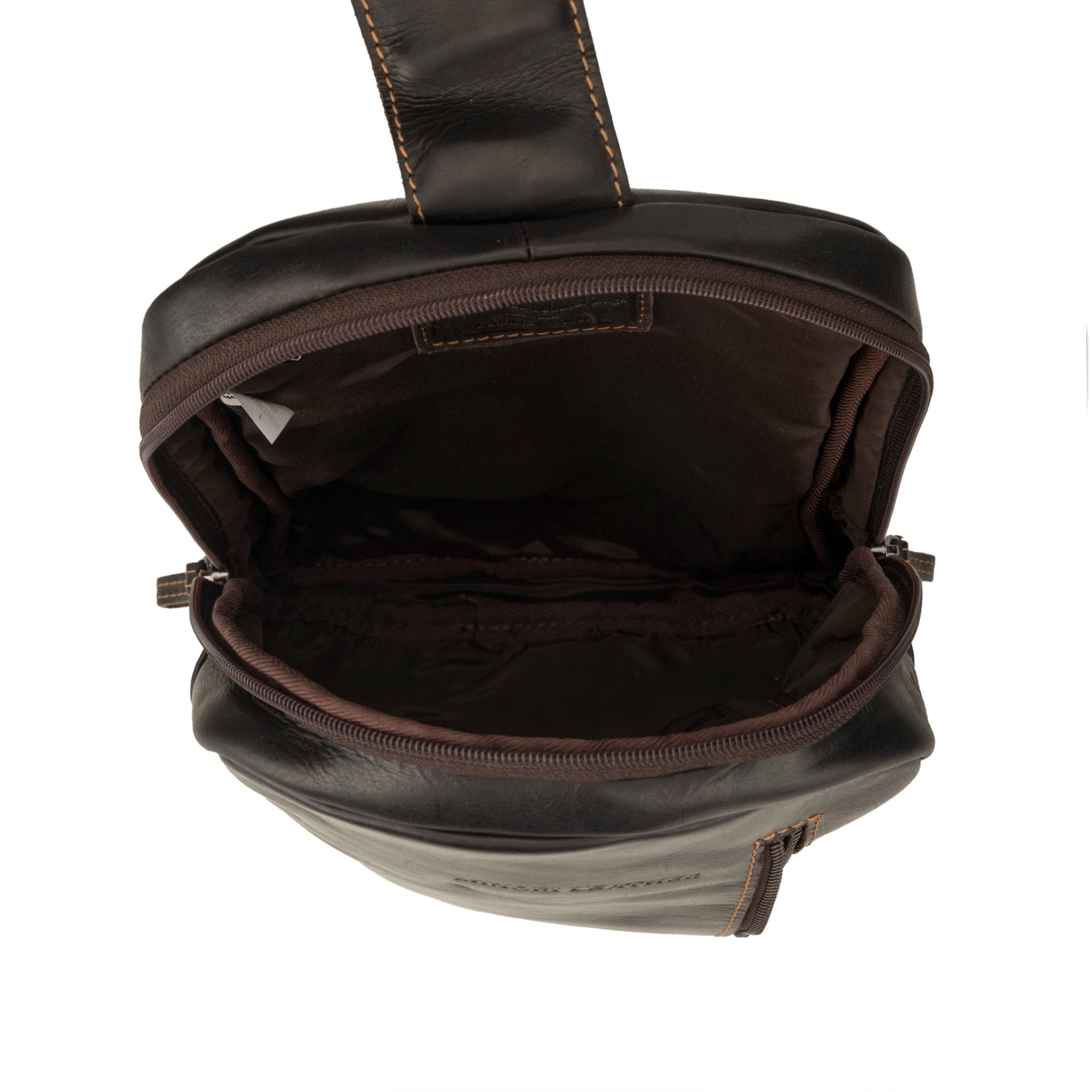 Top view of an open brown Minori leather crossbody sling bag showing spacious main compartment with dark lining.