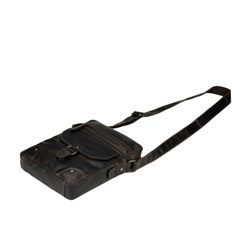 Minori Leather Denver leather crossbody bag in brown, unisex design with adjustable strap and front pocket, stylish and functional.