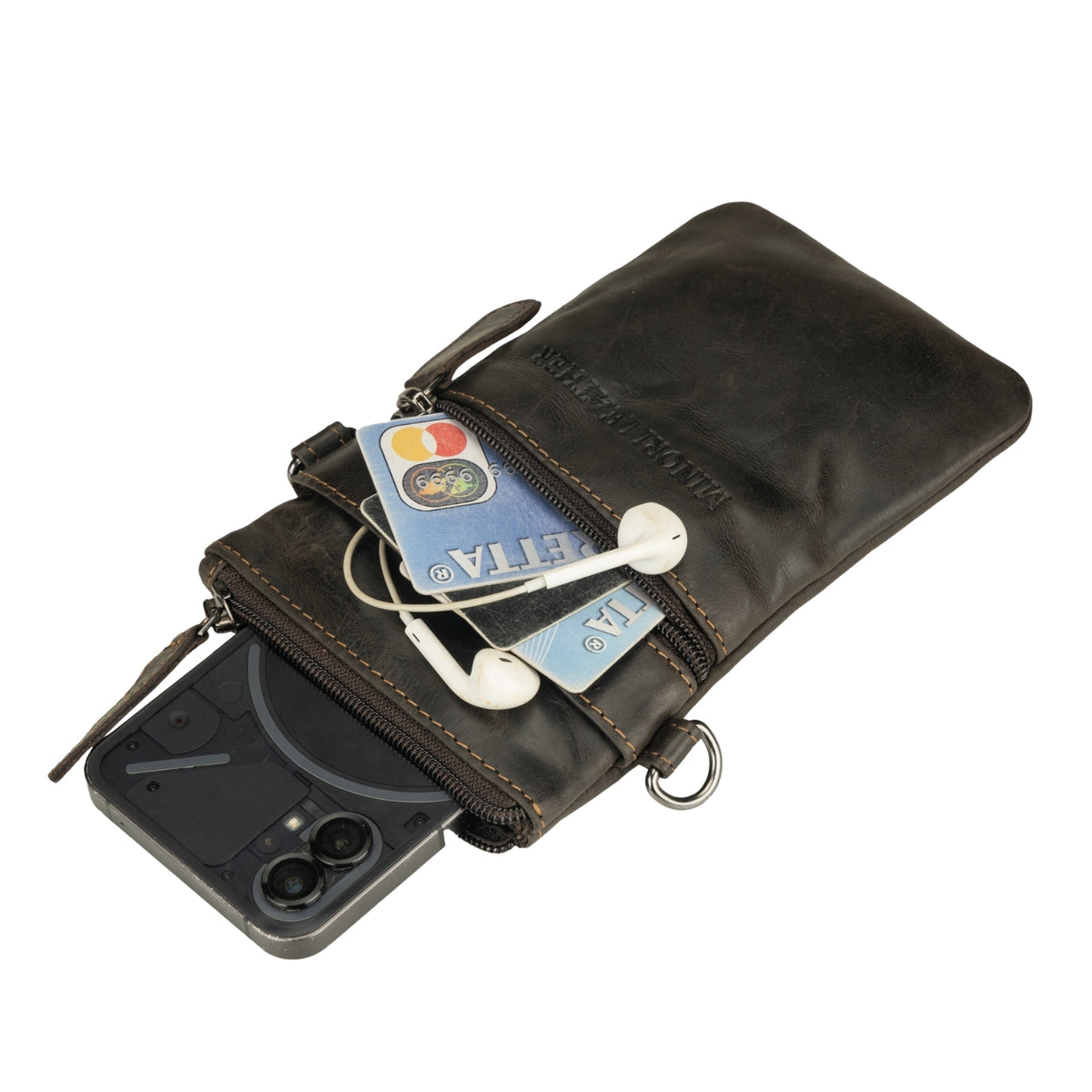 Minori Leather Ashford brown leather sling bag for unisex use, featuring a sleek design and adjustable strap.