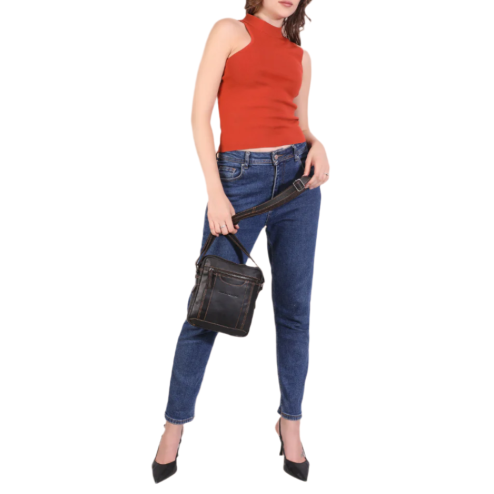 Woman holding a Brown Minori handbag wearing a red top and blue jeans on a white background