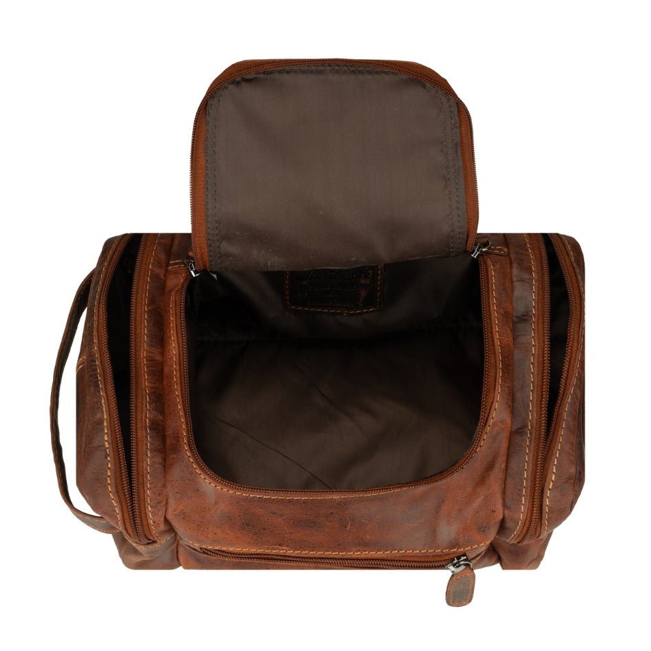 Minori Leather Winston chestnut leather toiletry bag with zipper closure and compact design for men's grooming essentials.