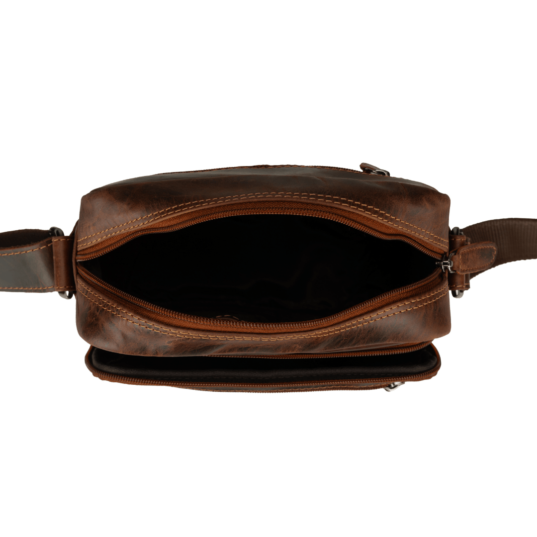 Minori Leather Harbor leather crossbody bag in chestnut with adjustable strap and sleek design, perfect for everyday use.