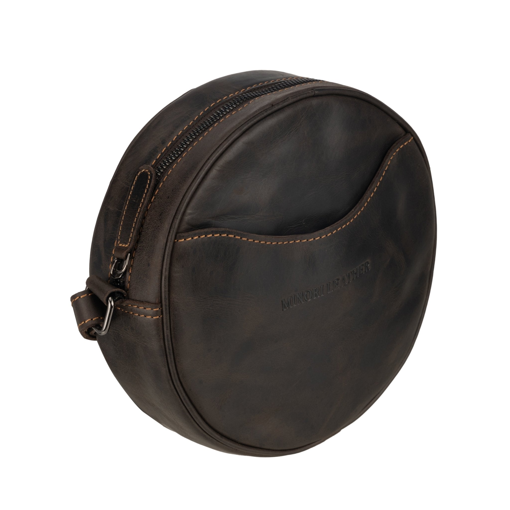 Minori Leather Luna round crossbody bag in chestnut brown leather with hair-on brown accents, stylish women's accessory.