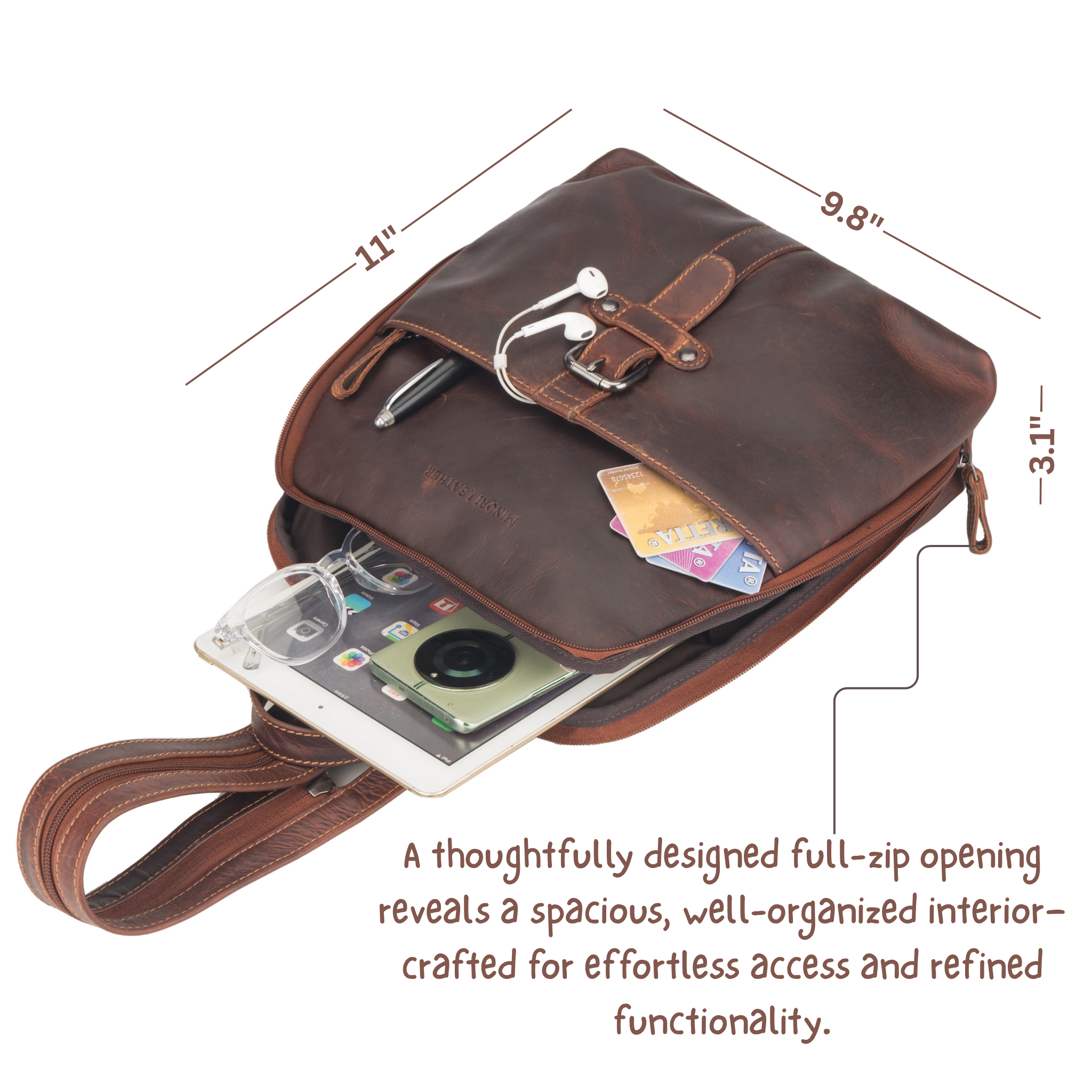 Chestnut brown Minori leather backpack with daily essentials like tablet, camera, cards, and earphones neatly packed.