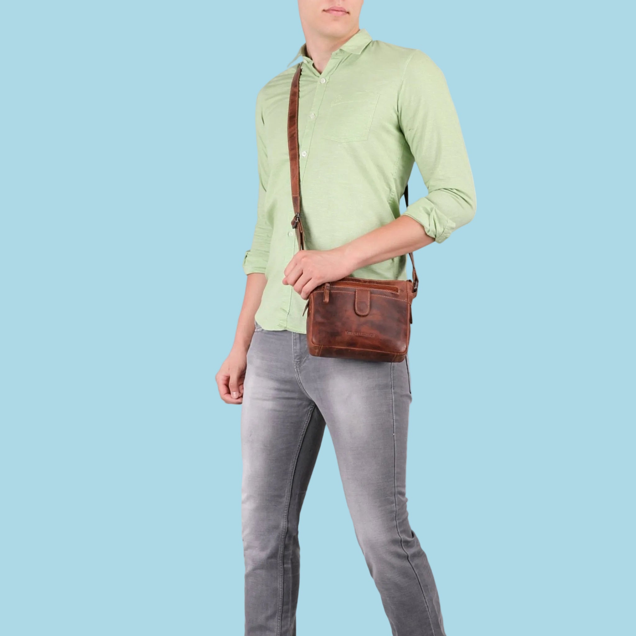 Minori Leather unisex chestnut leather crossbody bag with adjustable strap and sleek design, perfect for everyday use.