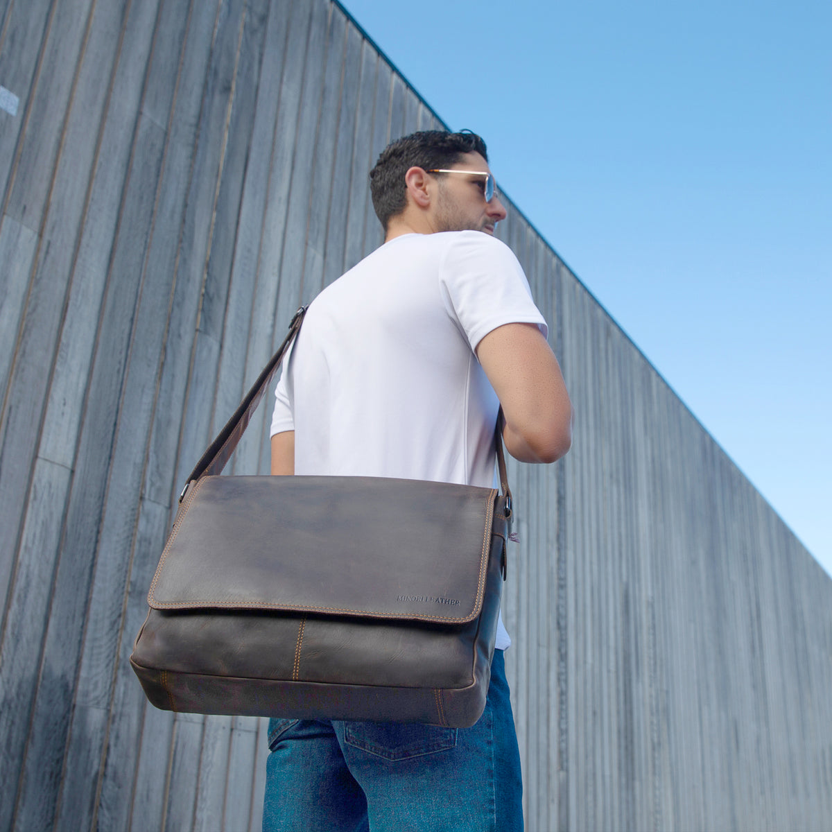 Minori Leather Richmond full grain leather 16-inch laptop messenger bag in brown with adjustable strap and multiple compartments.