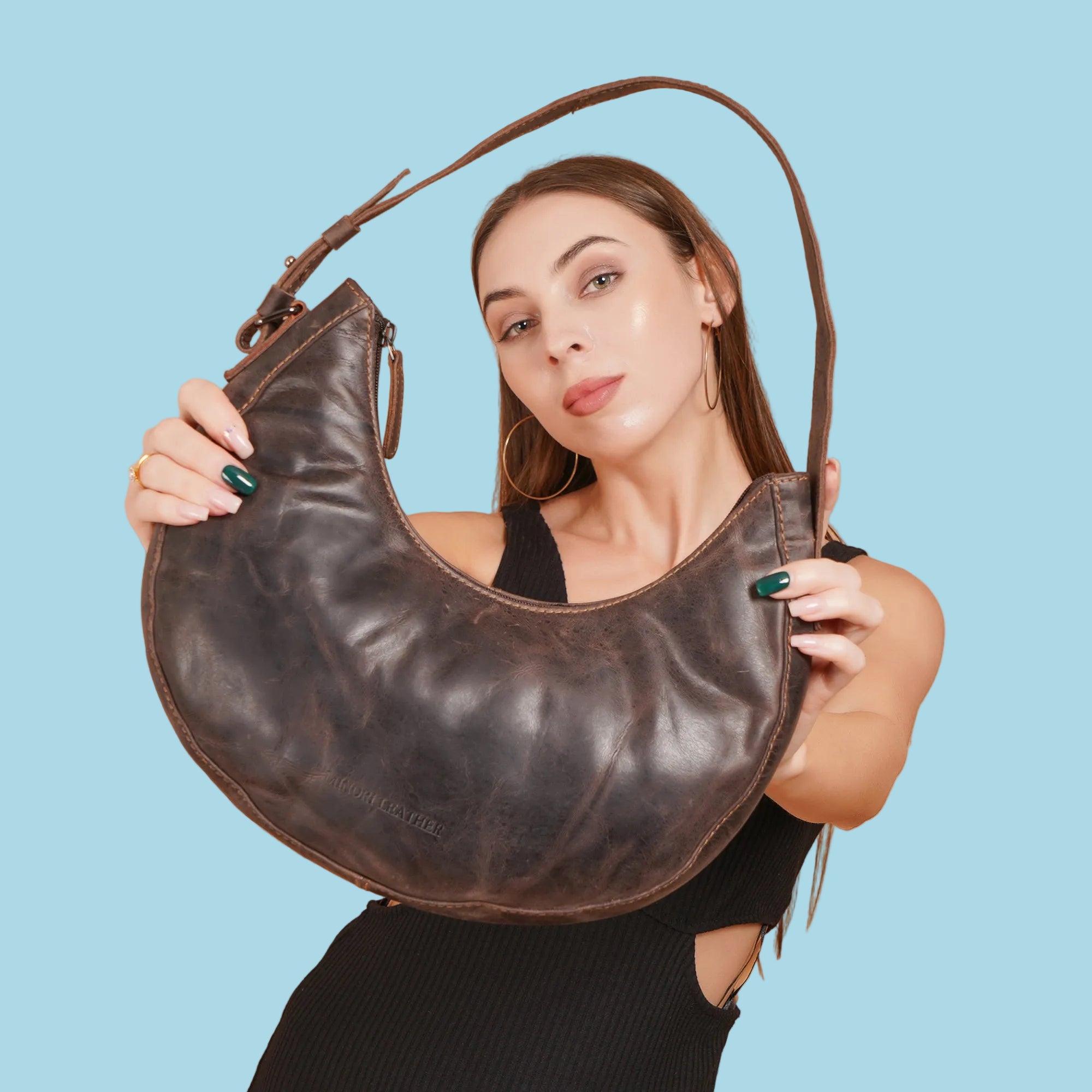 Minori Leather Selene Hobo Shoulder Bag made of smooth leather with a stylish, slouchy design and spacious interior.