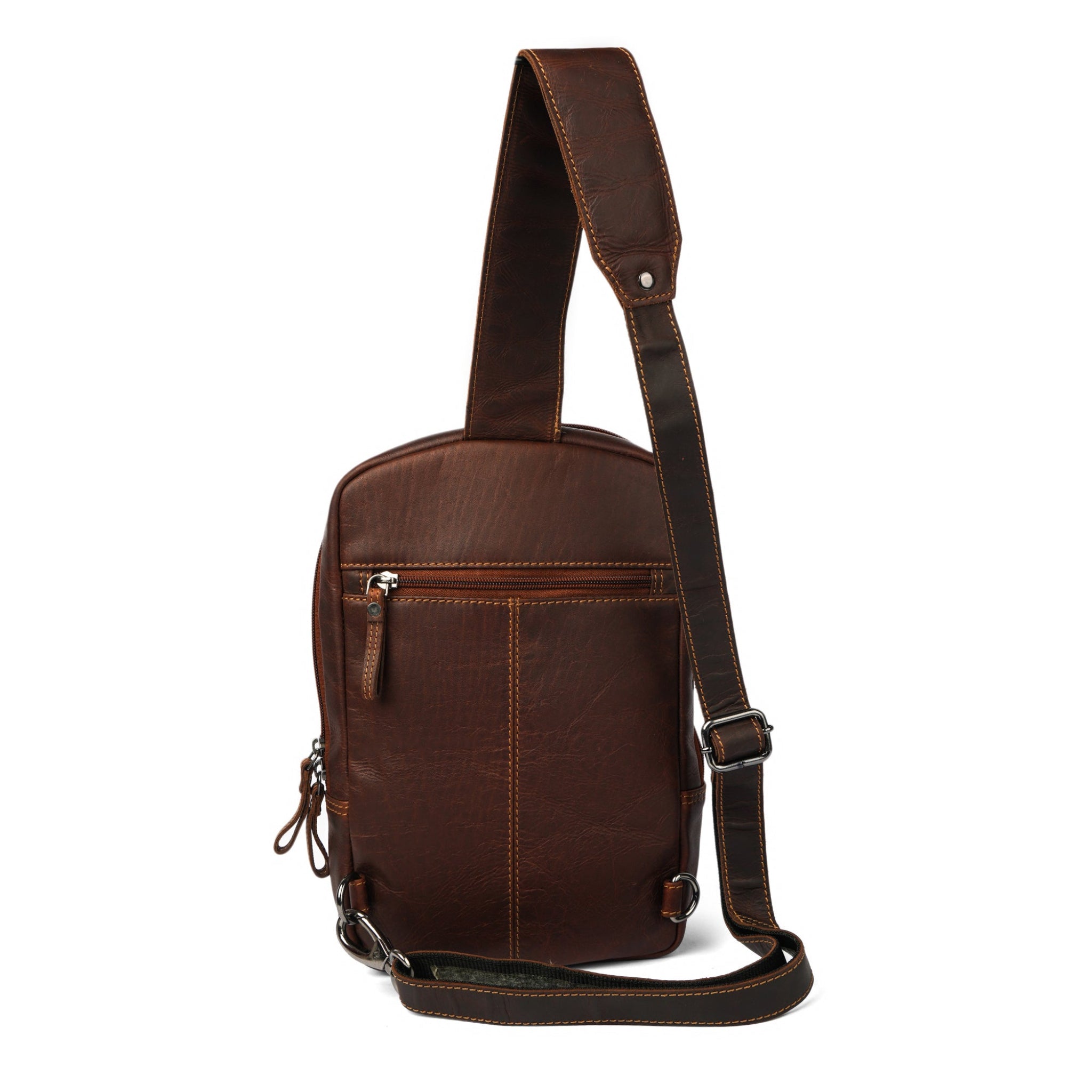 Rear view of a brown Minori leather sling bag featuring a horizontal zipper pocket and adjustable single strap.
