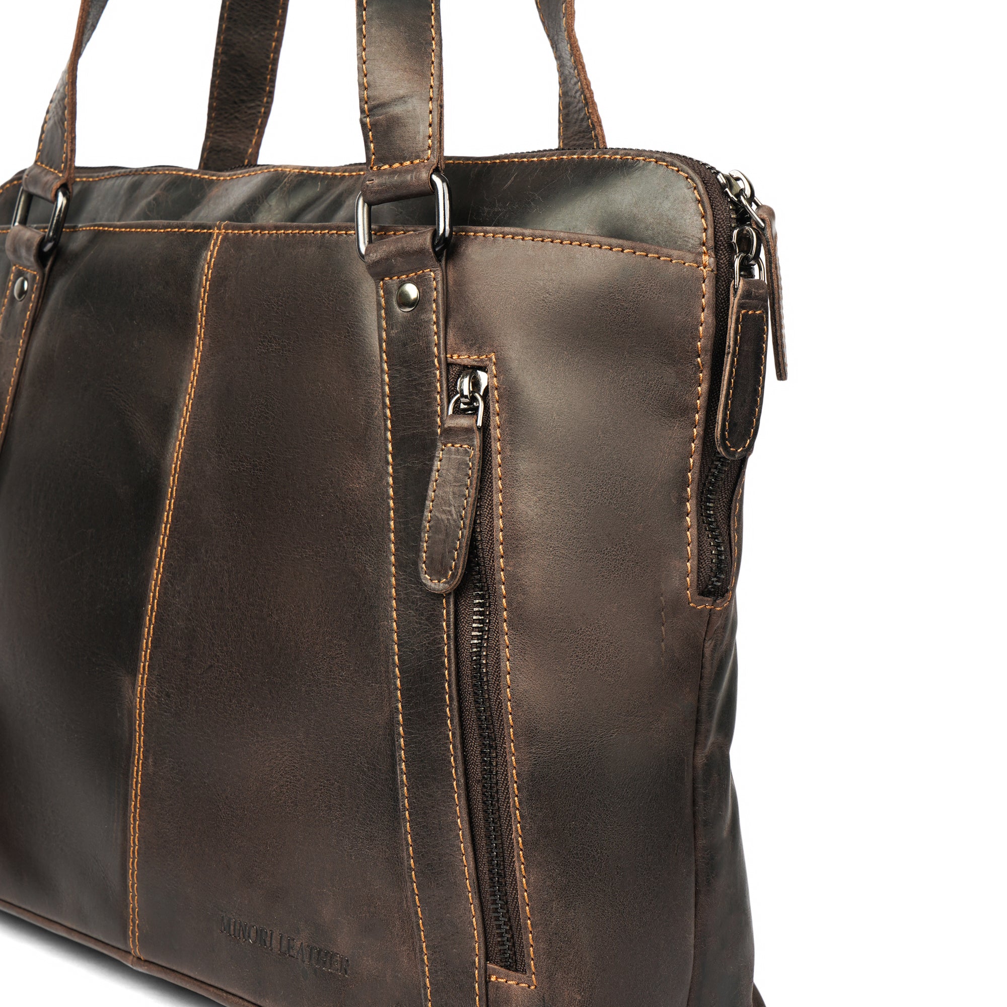 Minori Leather Camille leather laptop tote bag with sturdy handles and sleek design, perfect for carrying laptops and essentials.