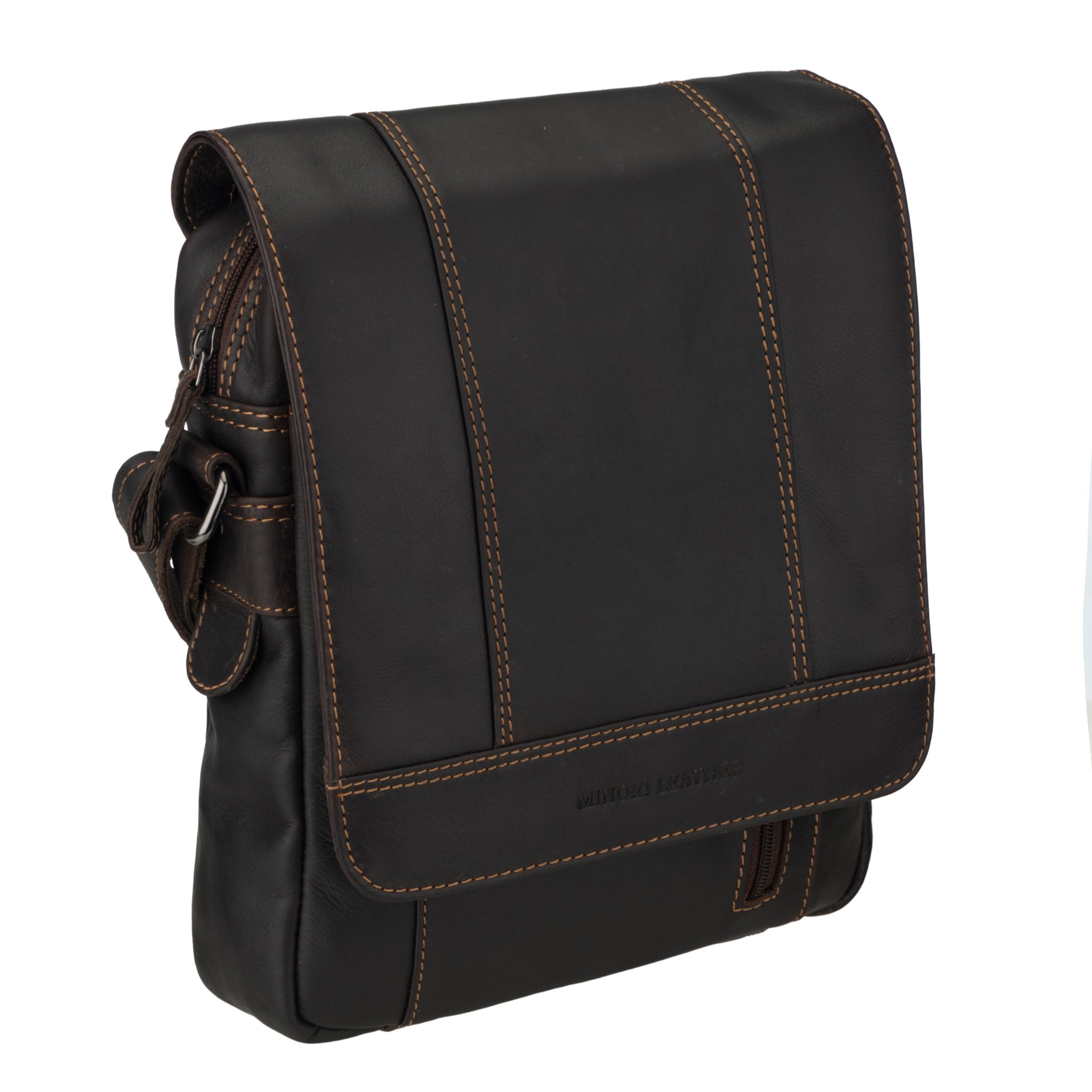 Angled view of  brown Minori leather bag with brown stitching on a white background
