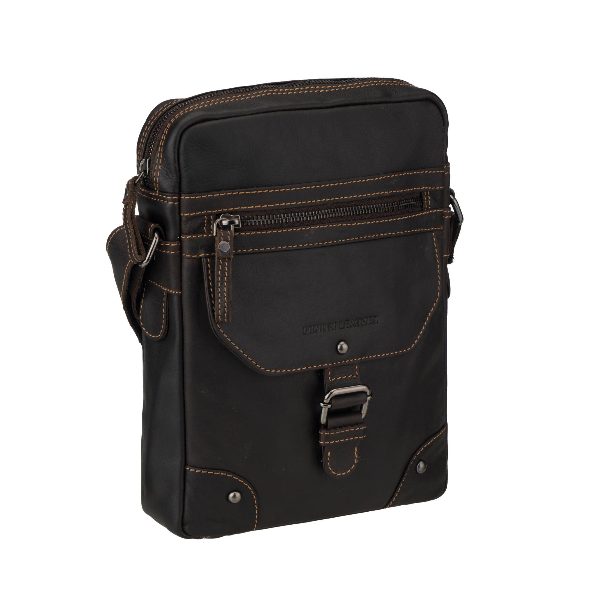 Angled front view of a brown Minori leather crossbody bag with visible zipper and flap detailing.
