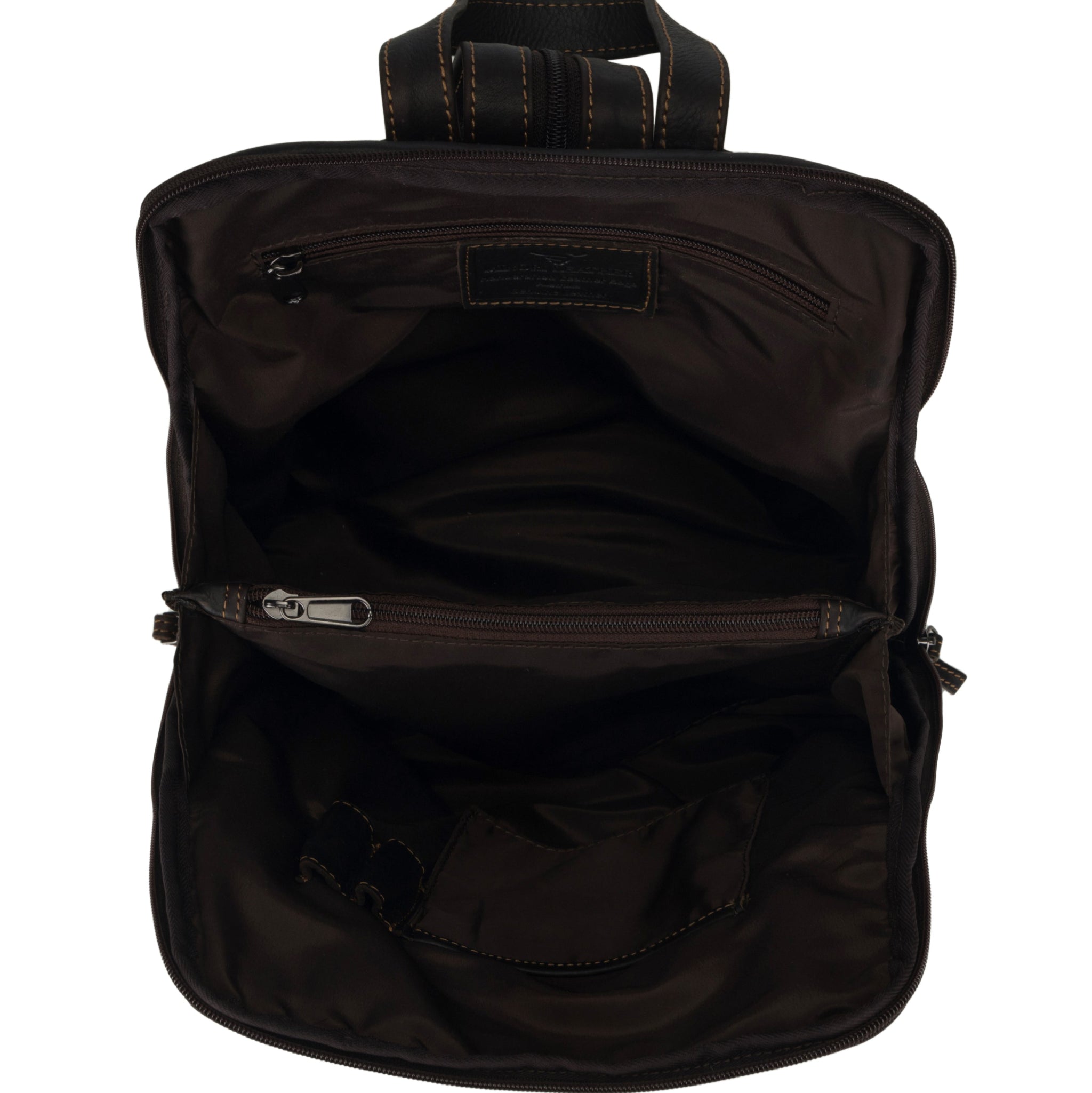Interior view of the chestnut brown Minori leather backpack showing the spacious compartment with multiple pockets.