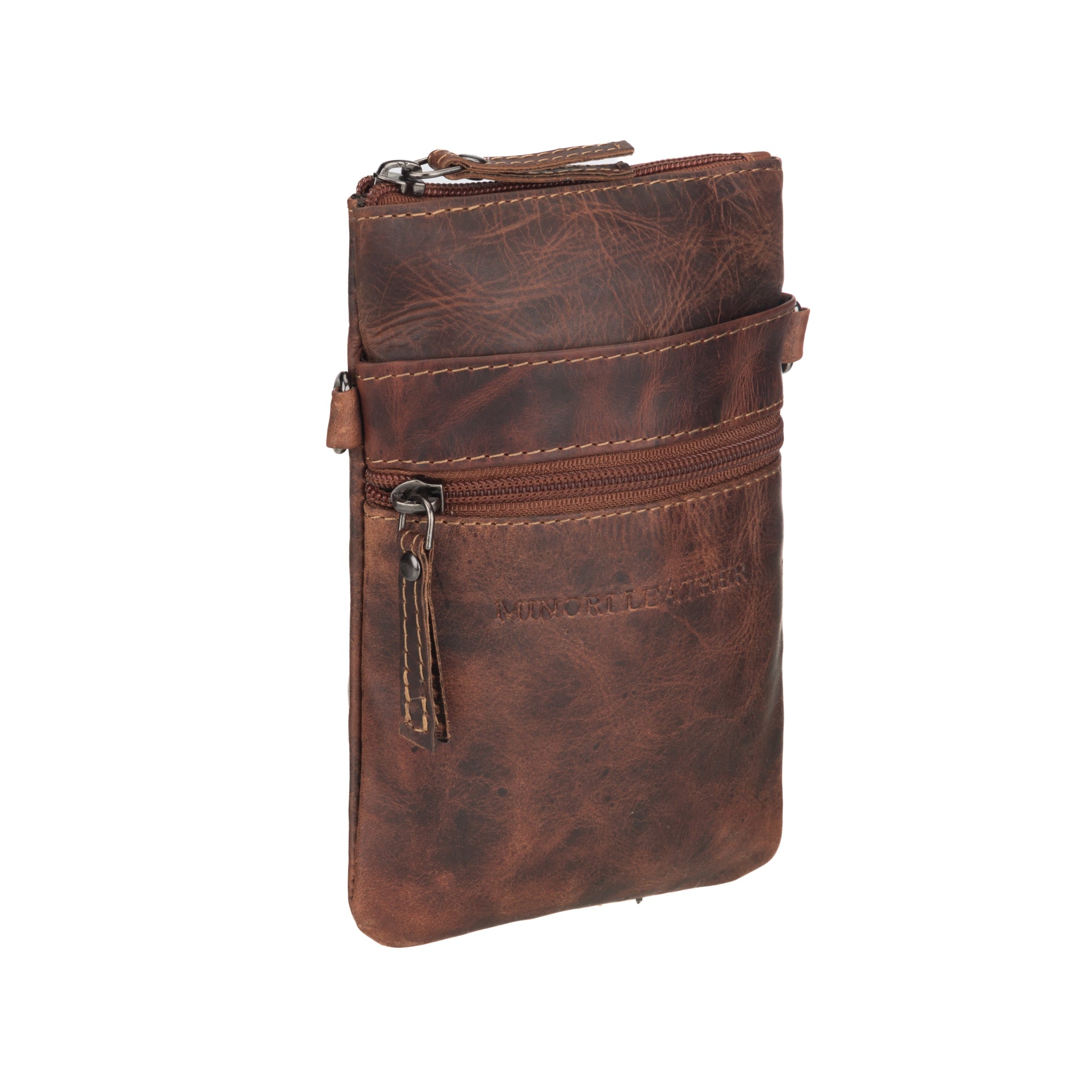 Angled view of chestnut brown Minori leather pouch showing texture and zipper detail.