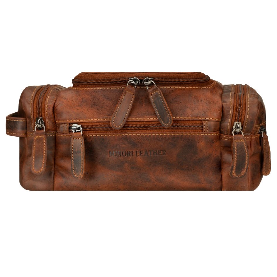 Minori Leather Winston chestnut leather toiletry bag with zipper closure and compact design for men's grooming essentials.
